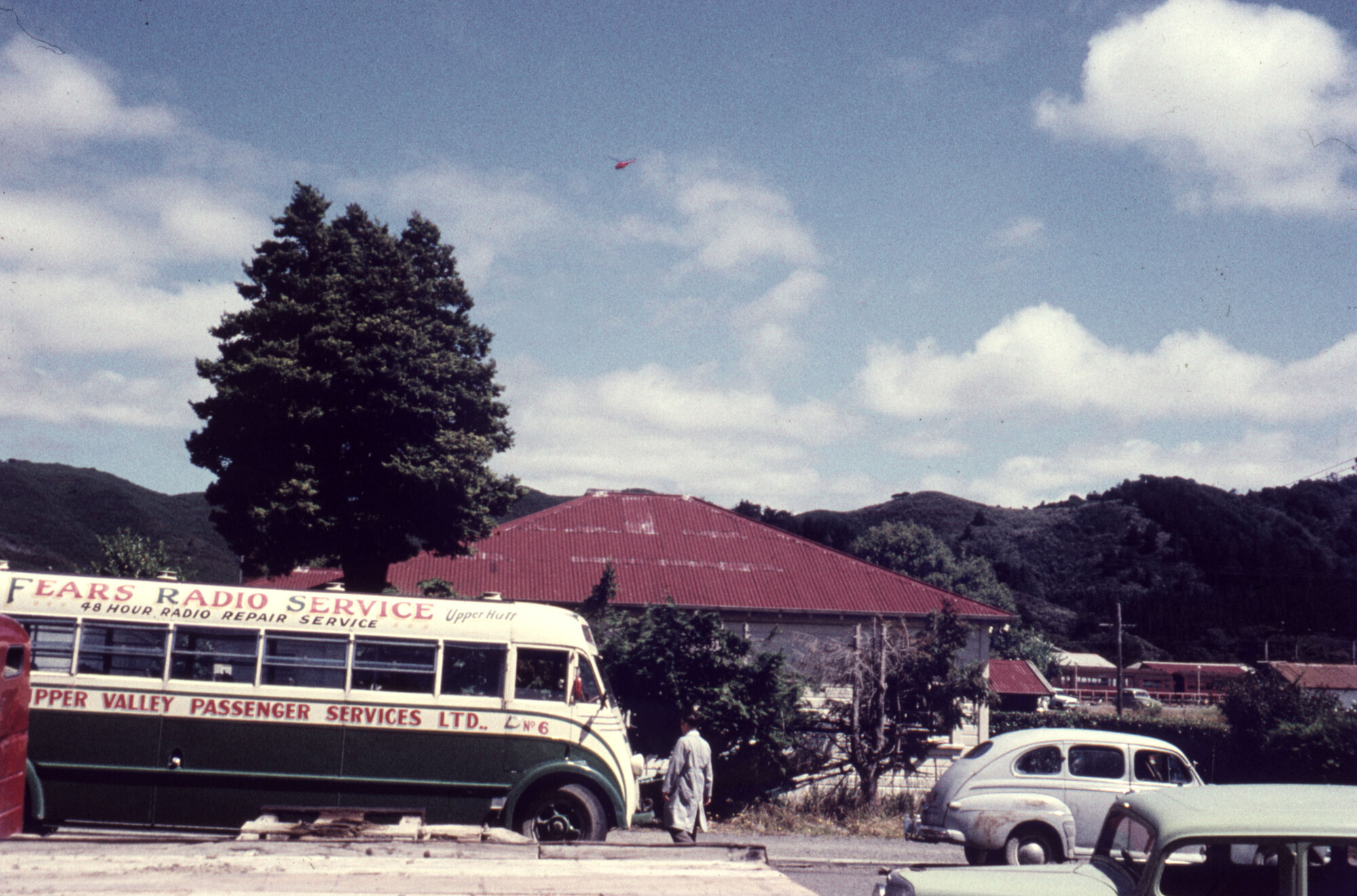 Bus outside Ken Geange's House; ca. 1960s