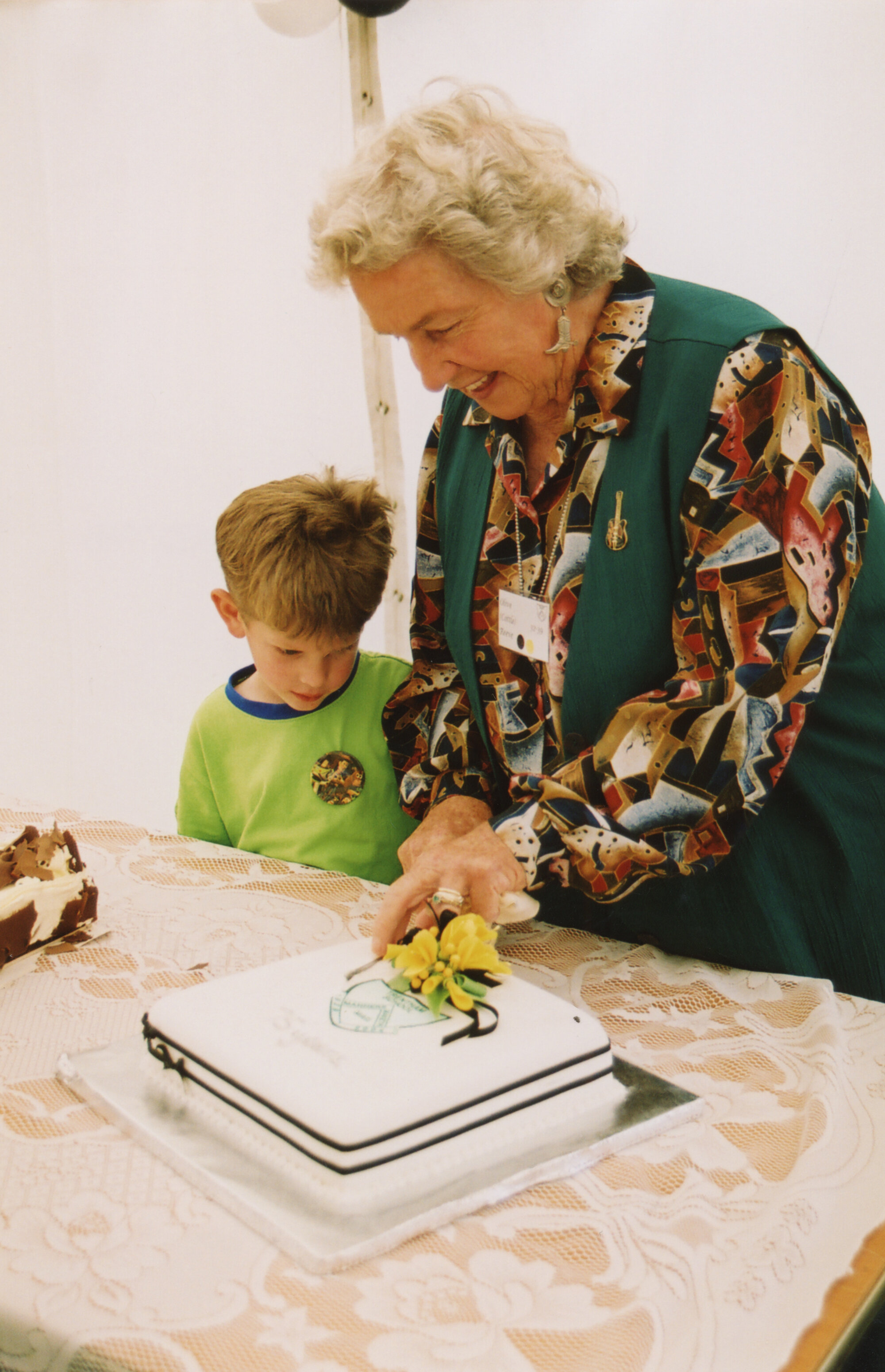 Trentham School 75th Reunion; Cutting of Celebration Cake; 2004