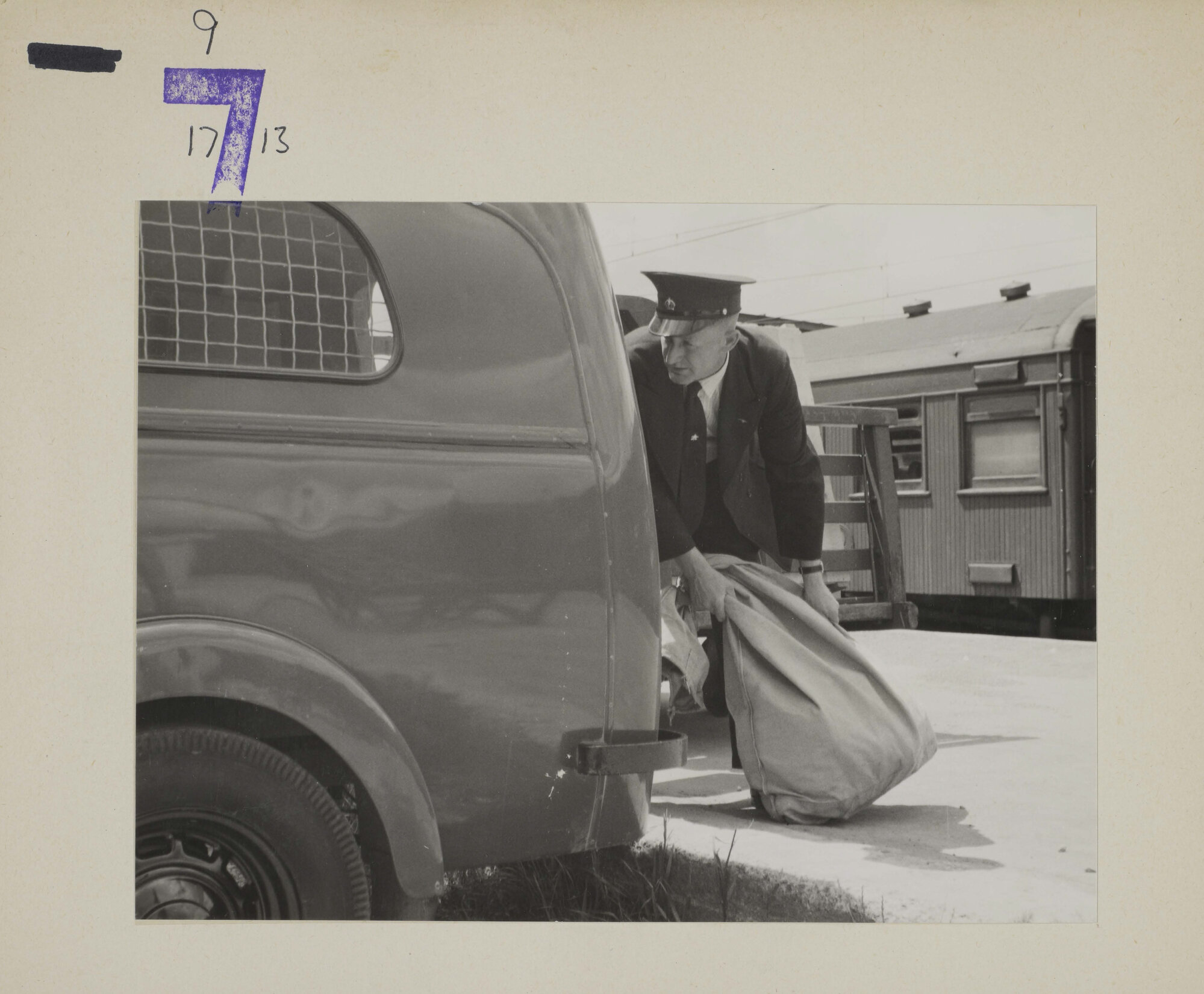 Clearing Mail at Upper Hutt from Suburban Train; 1954