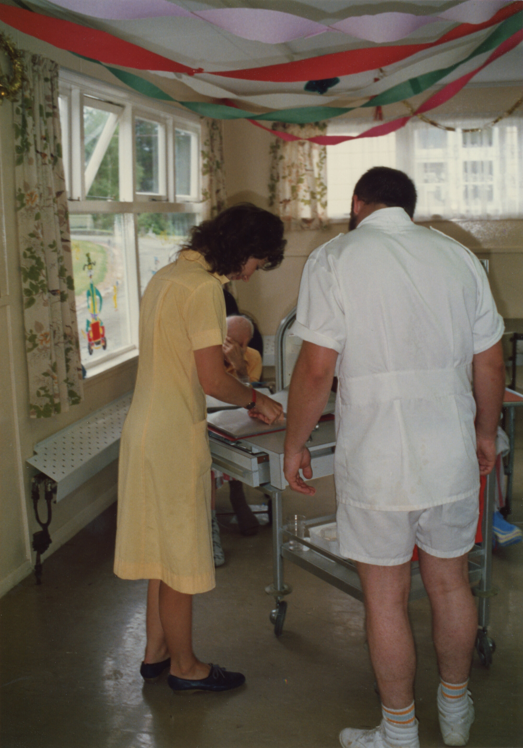 Silverstream Hospital; Enrolled Nurse Tending to Patient; 1988