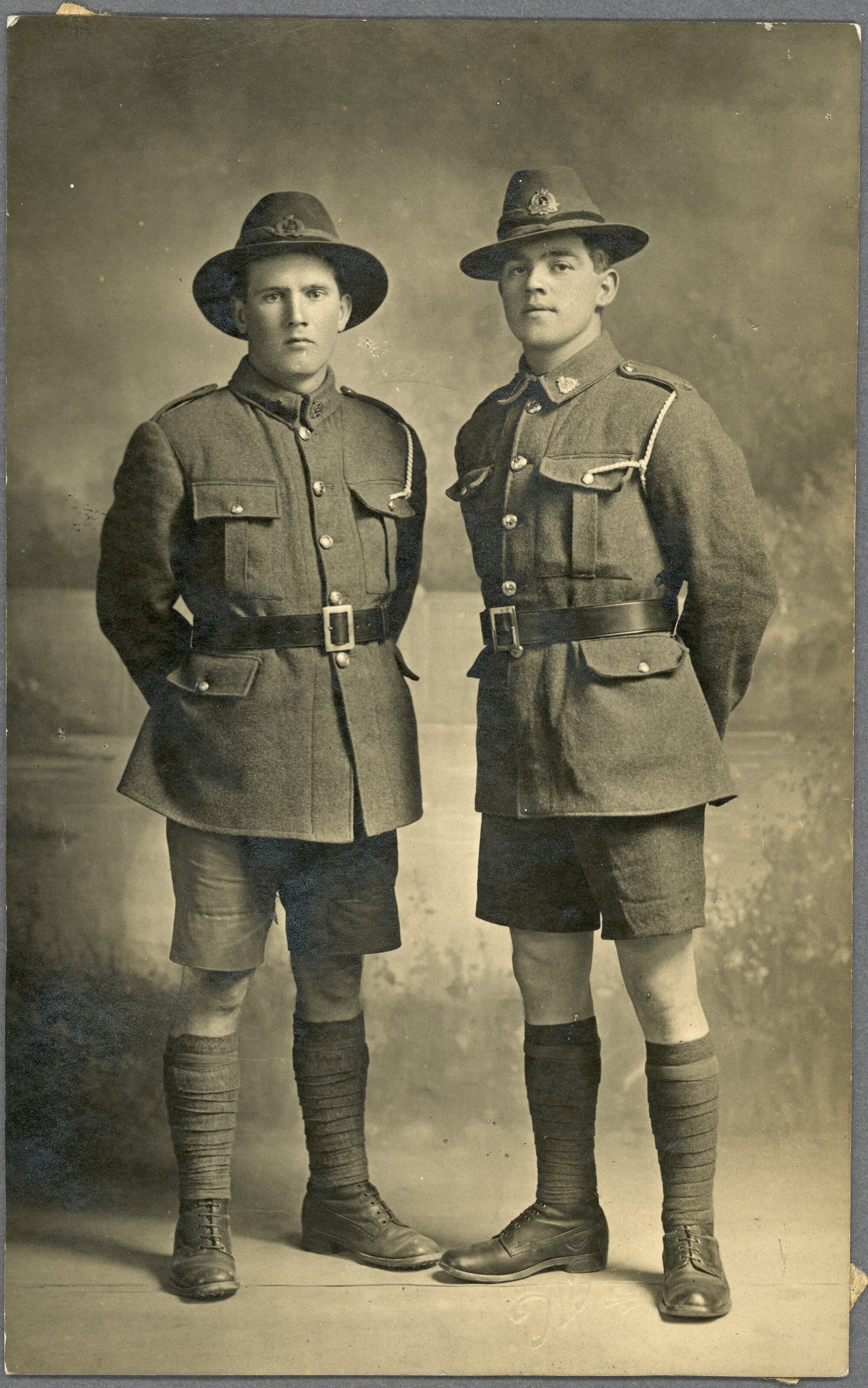 Walter Clifford and friend (?) in Army uniform; studio photograph.