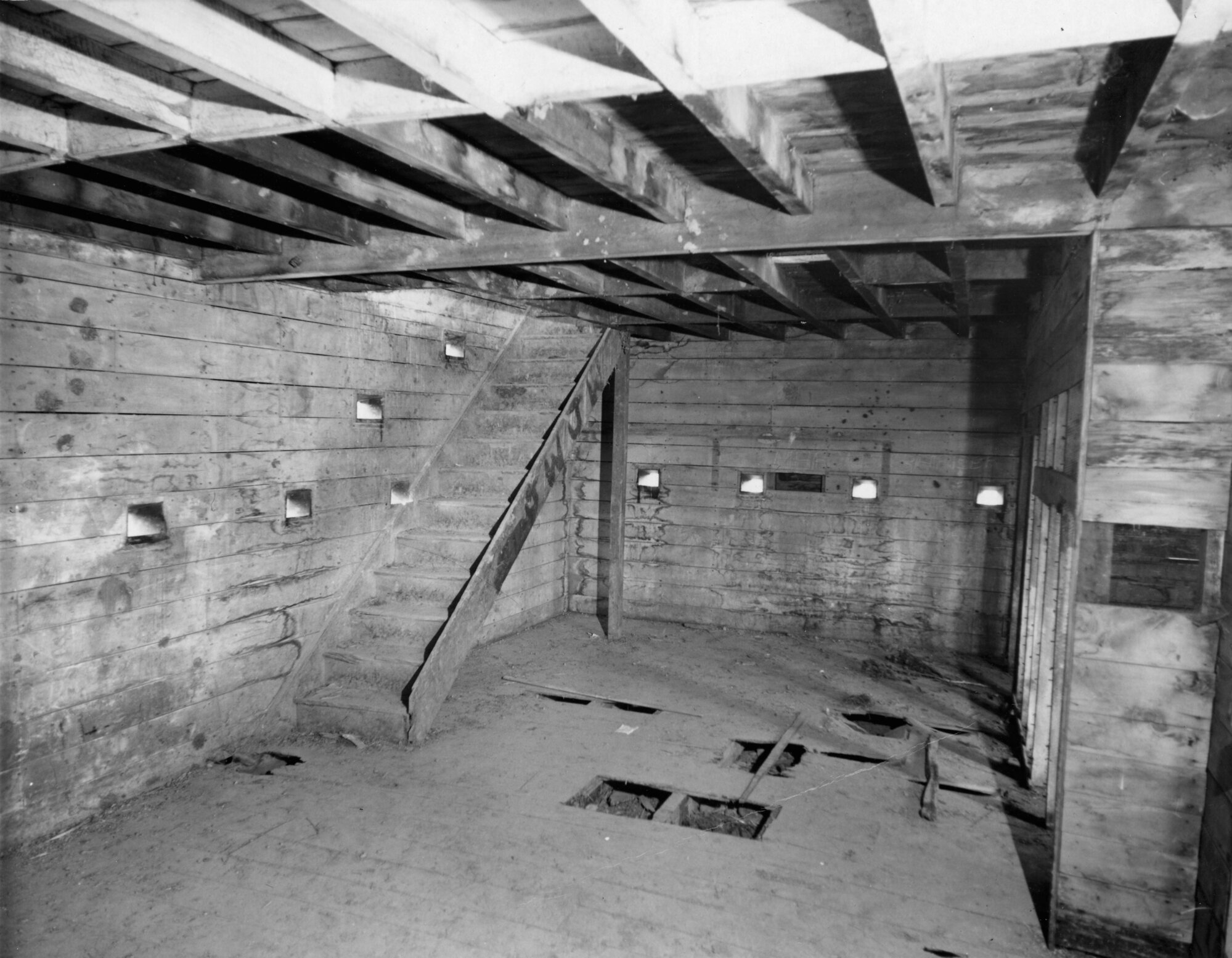 Blockhouse; interior, prior to restoration; lower floor. [P2-609-1512]