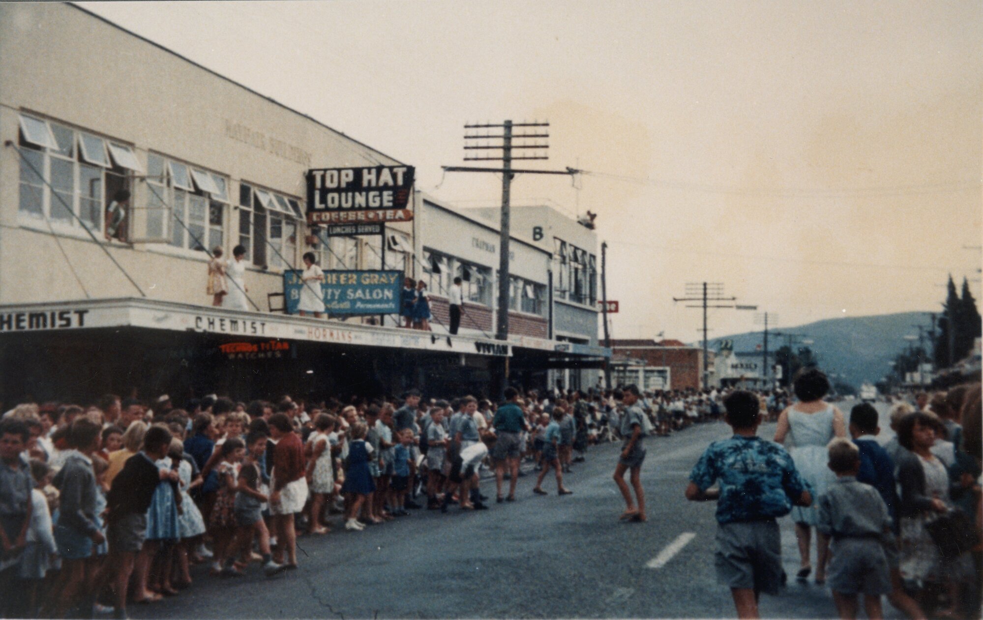 Main Street; elephant race to raise money for Maidstone pools filtration plant; Main Street crowd.