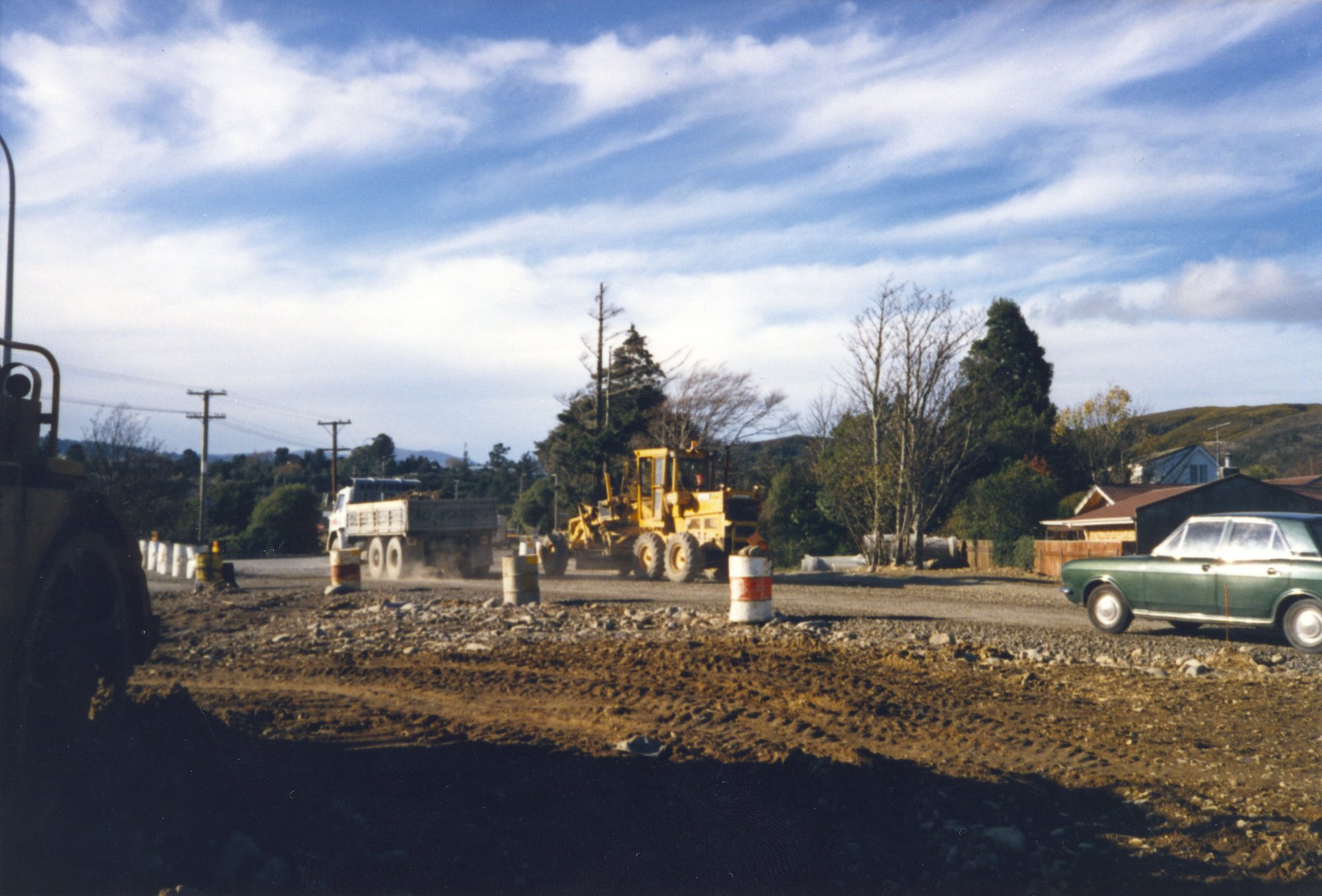 River Road construction; grader and truck on Fergusson Drive, Maoribank.