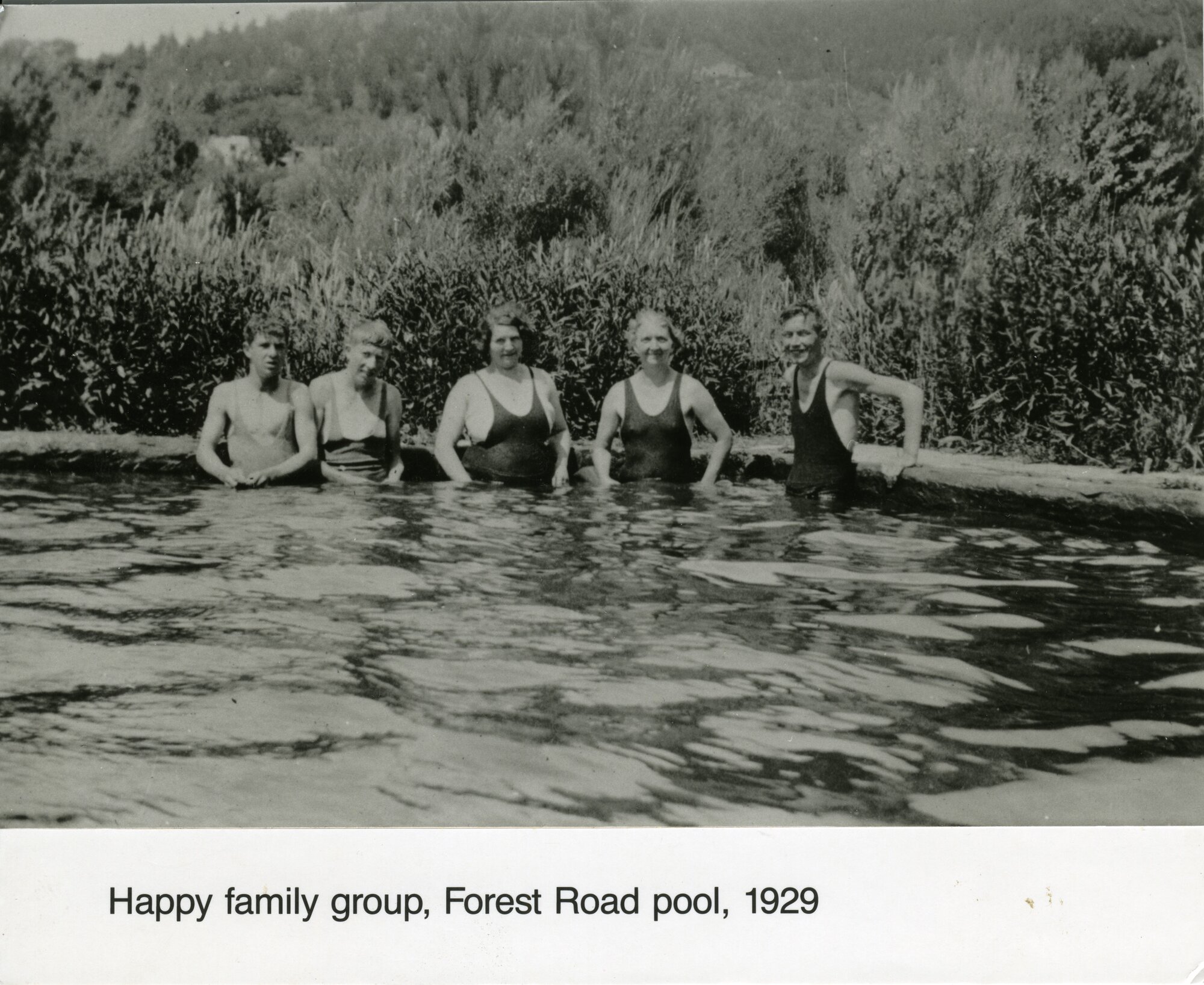Forest Road pool, Pinehaven; happy family group.
