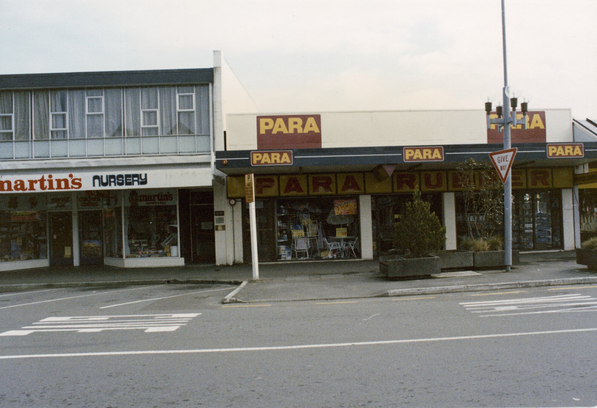 Main Street 1989  5; Martin's toy shop, No. 93-95 and Para Rubber, 97-101.