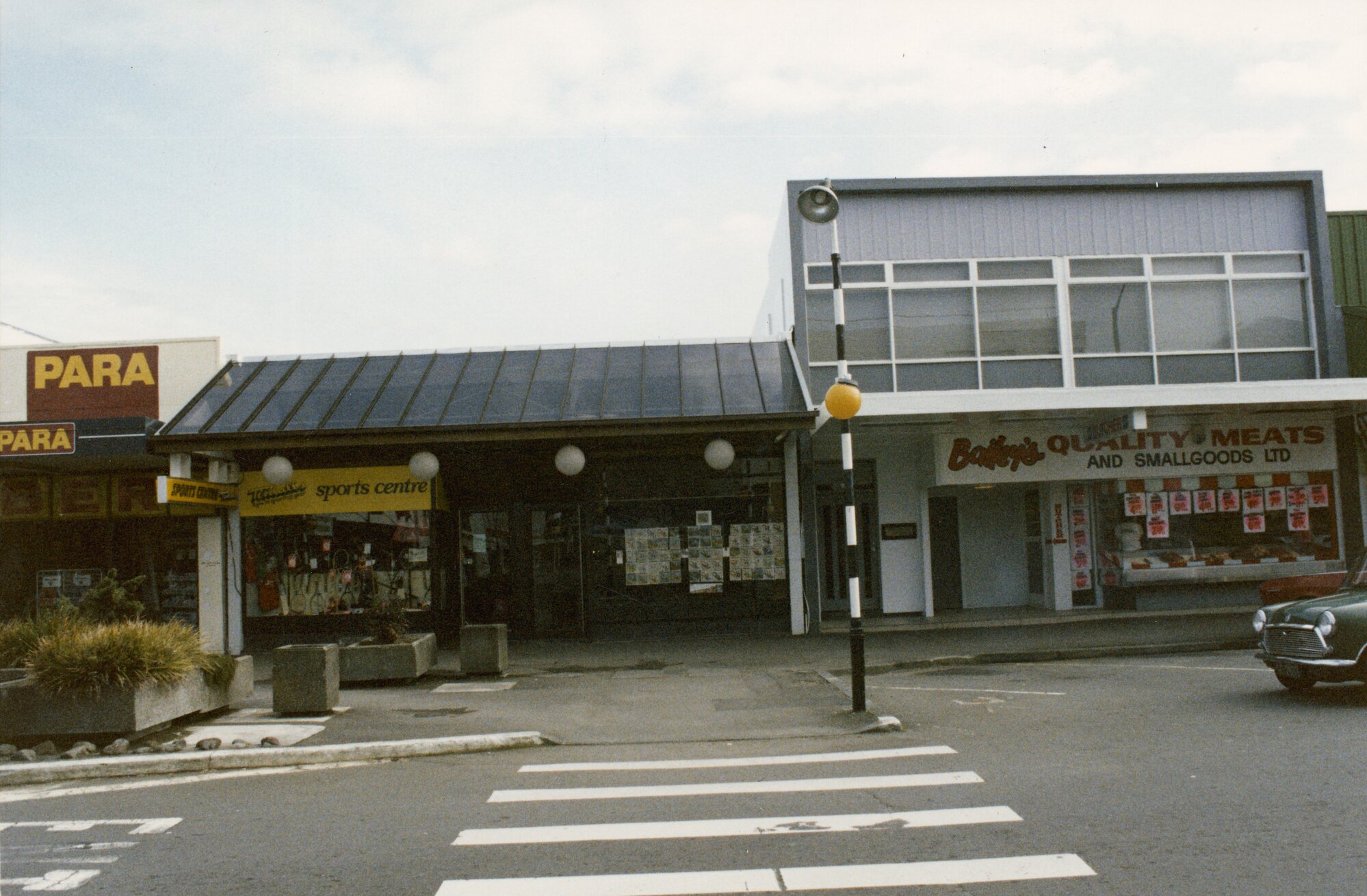 Main Street 1989  6; Tisdalls Sports Centre and Bailey's Meats.