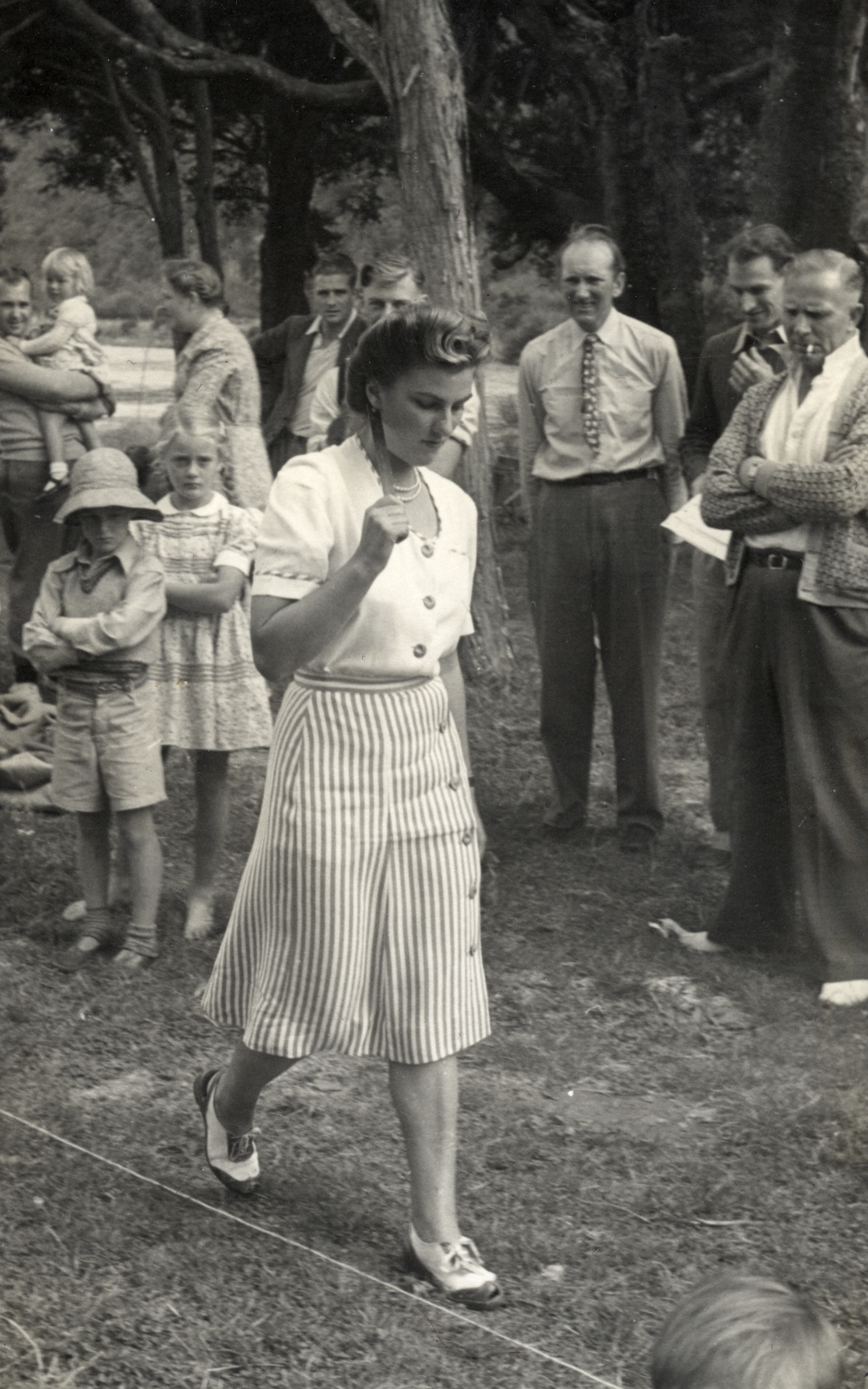 Dunlop factory; first-tyre ceremony; unknown woman; Sylvia Williams second child from left.