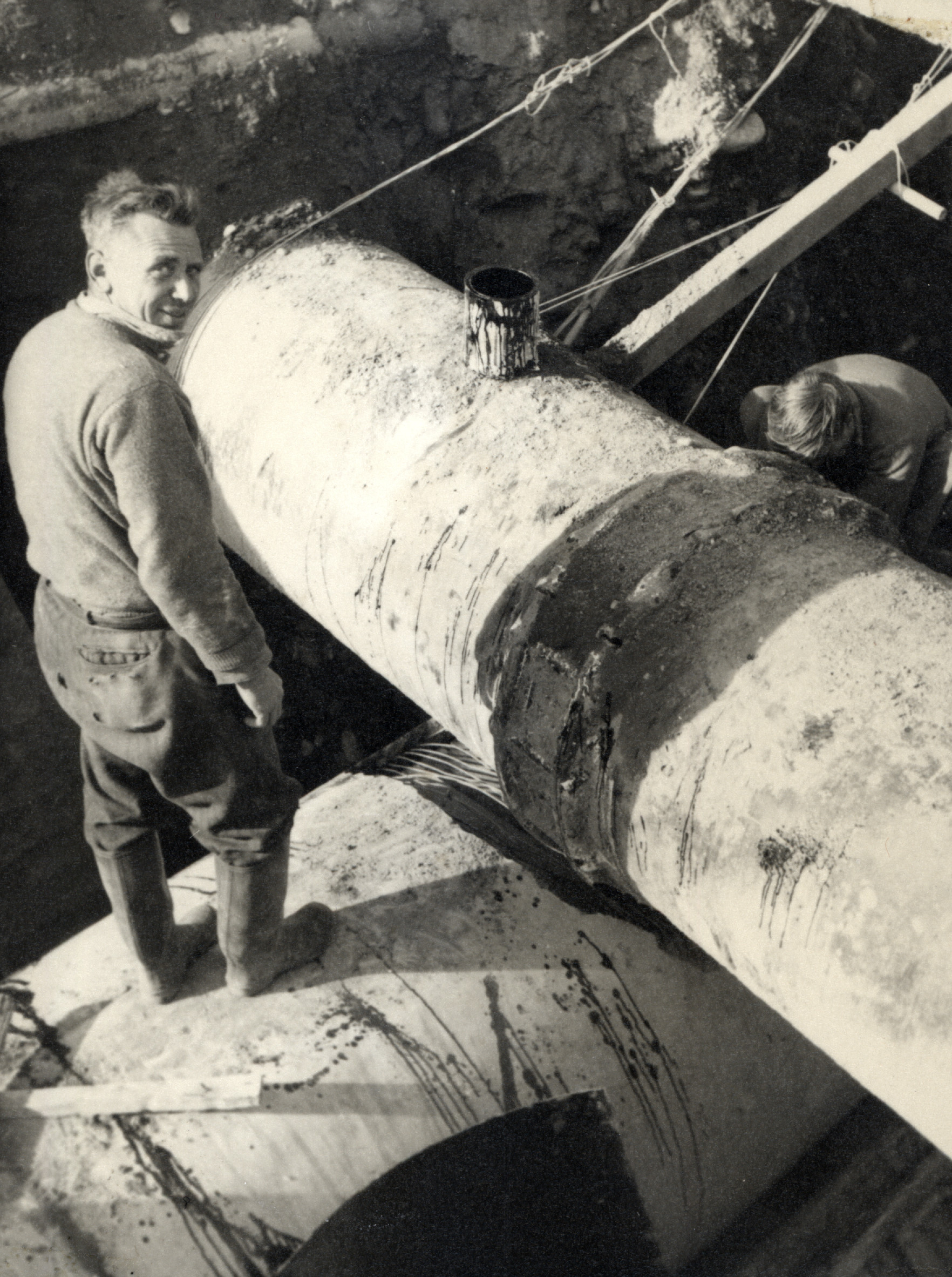Drainage; 54" stormwater under 36" watermain, corner Pine Ave and Main St. June 1957. Cess Hollis (Foreman) Overseer (Later)