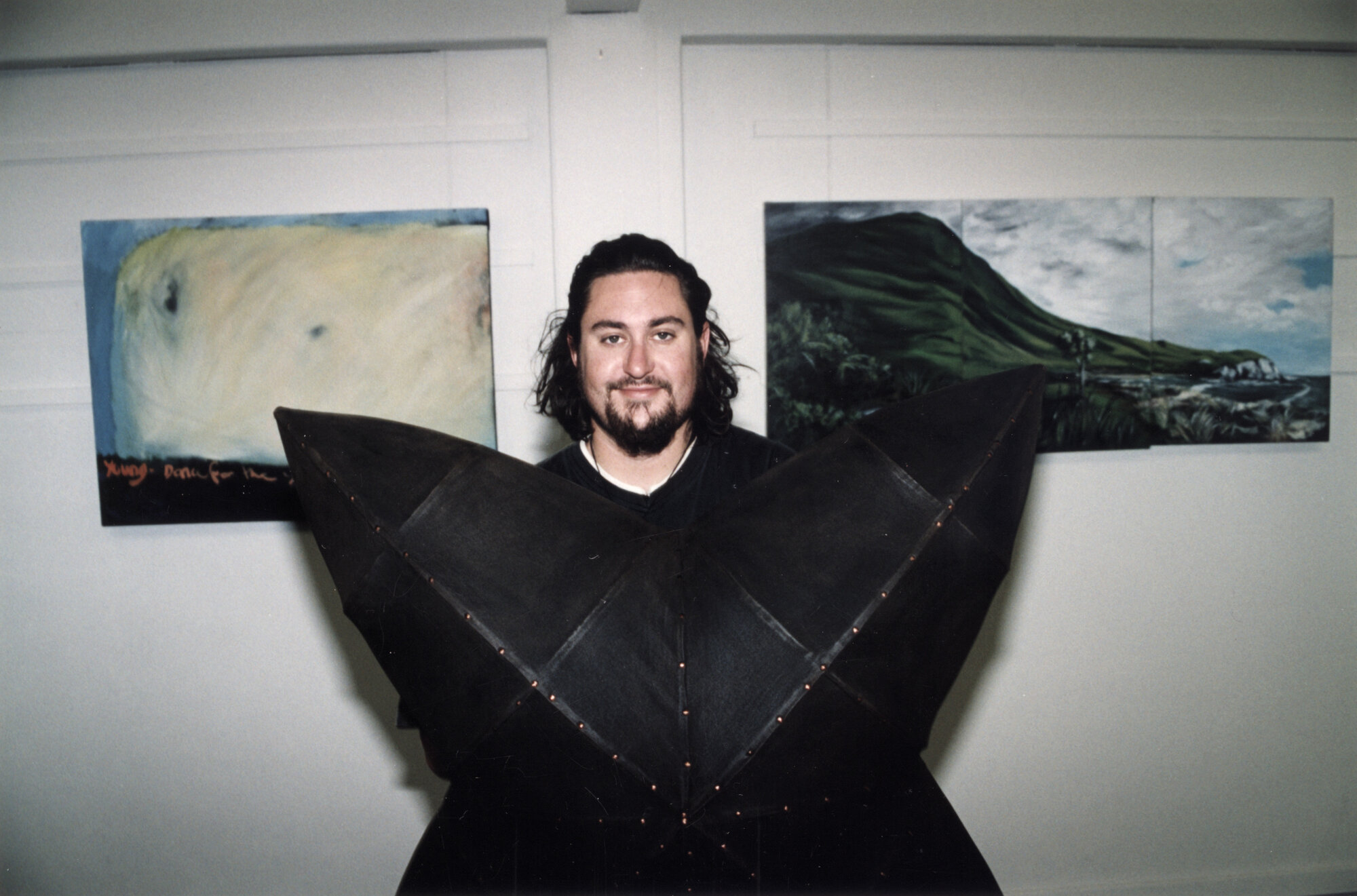 Archibald's Gallery; Will Yates with artworks by himself and two friends.