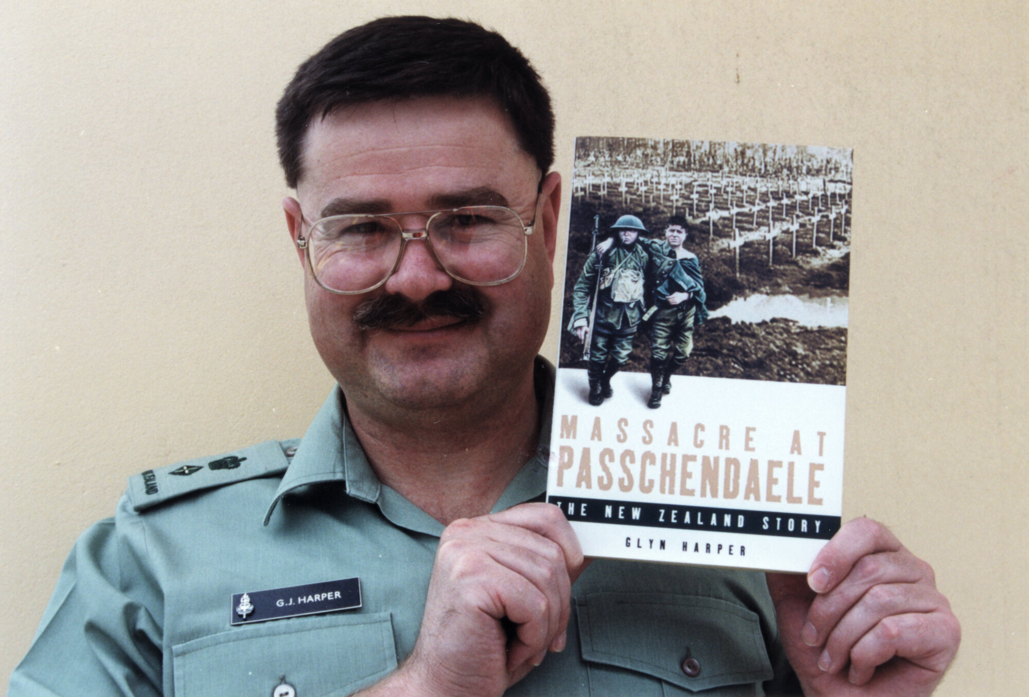 Lieutenant-Colonel Glyn Harper with his book 'Massacre at Passchendaele'.
