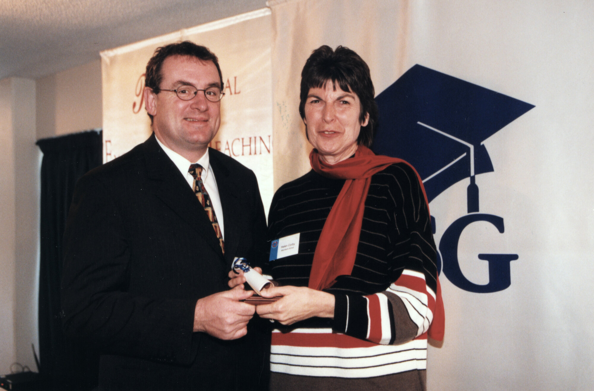 Maoribank School; Helen Corby receives ASG National Excellence in Teaching regional award from Minister of Education Trevor Mallard.