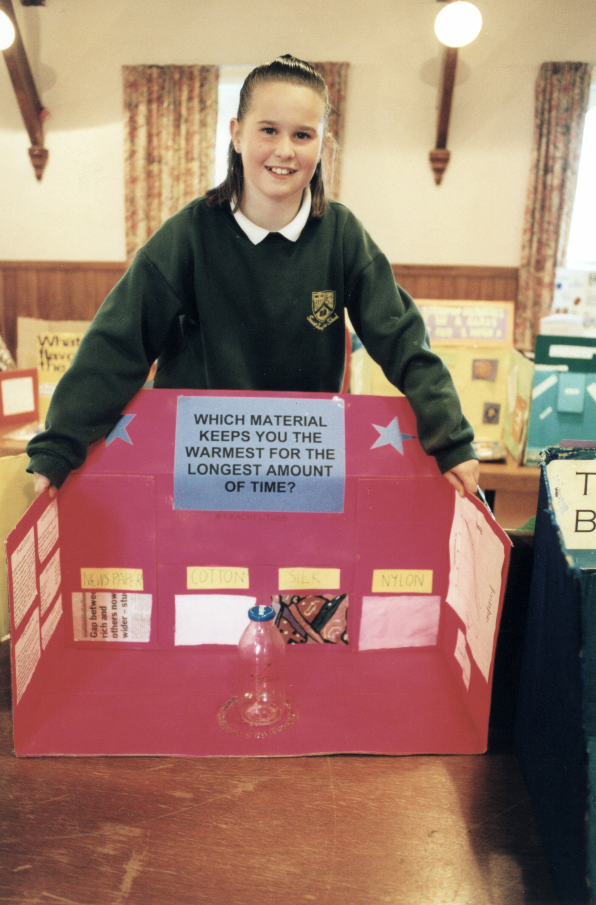 St Joseph's School science fair; Rachel Tubb tests insulation of bottled boiling water.