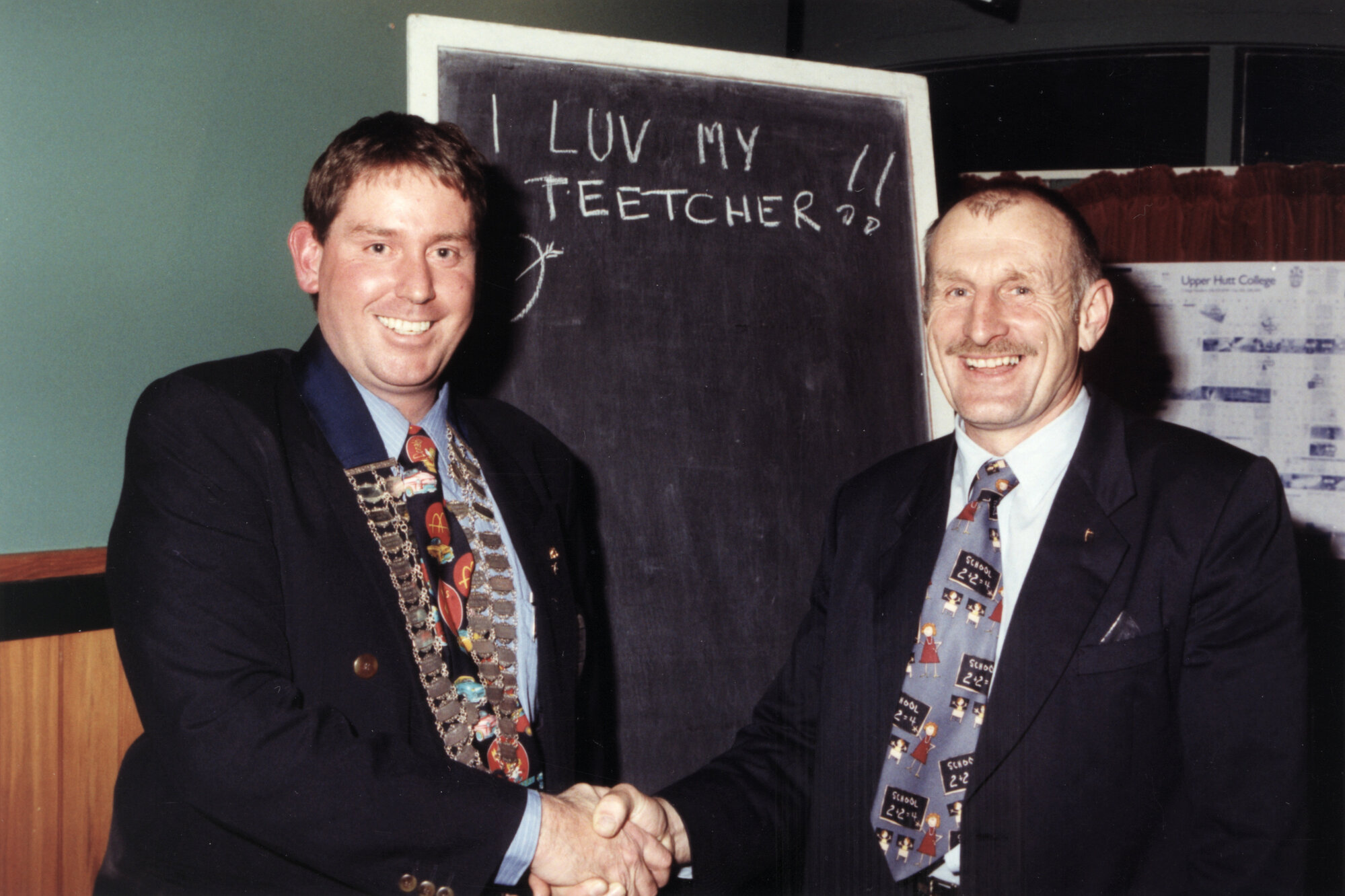 Upper Hutt Rotary; new president, McDonald's branch owner Murray Lord and predecessor Peter Lee.