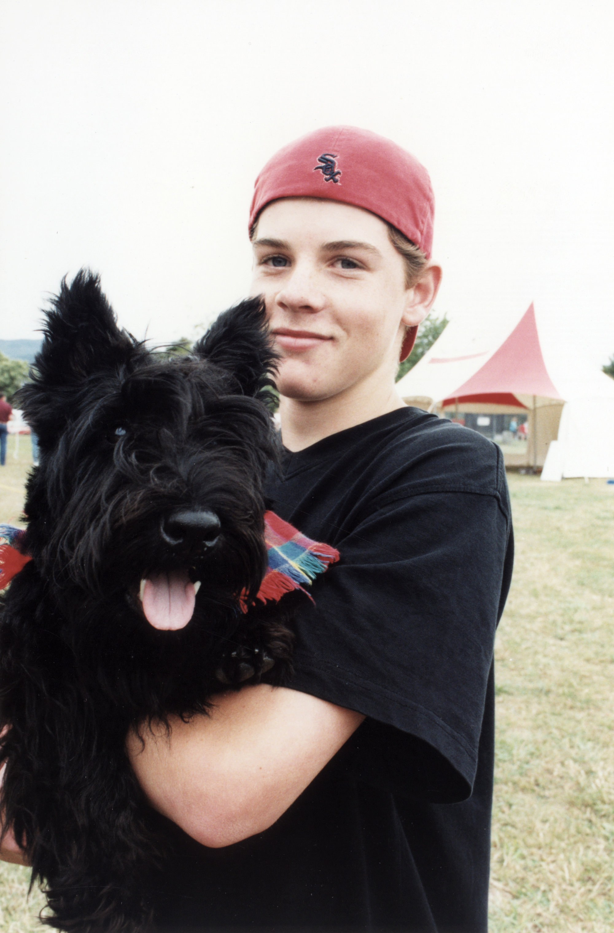 Moggy Dog Show; Patrick Wyatt and 5-month-old Scottish terrier Guss.