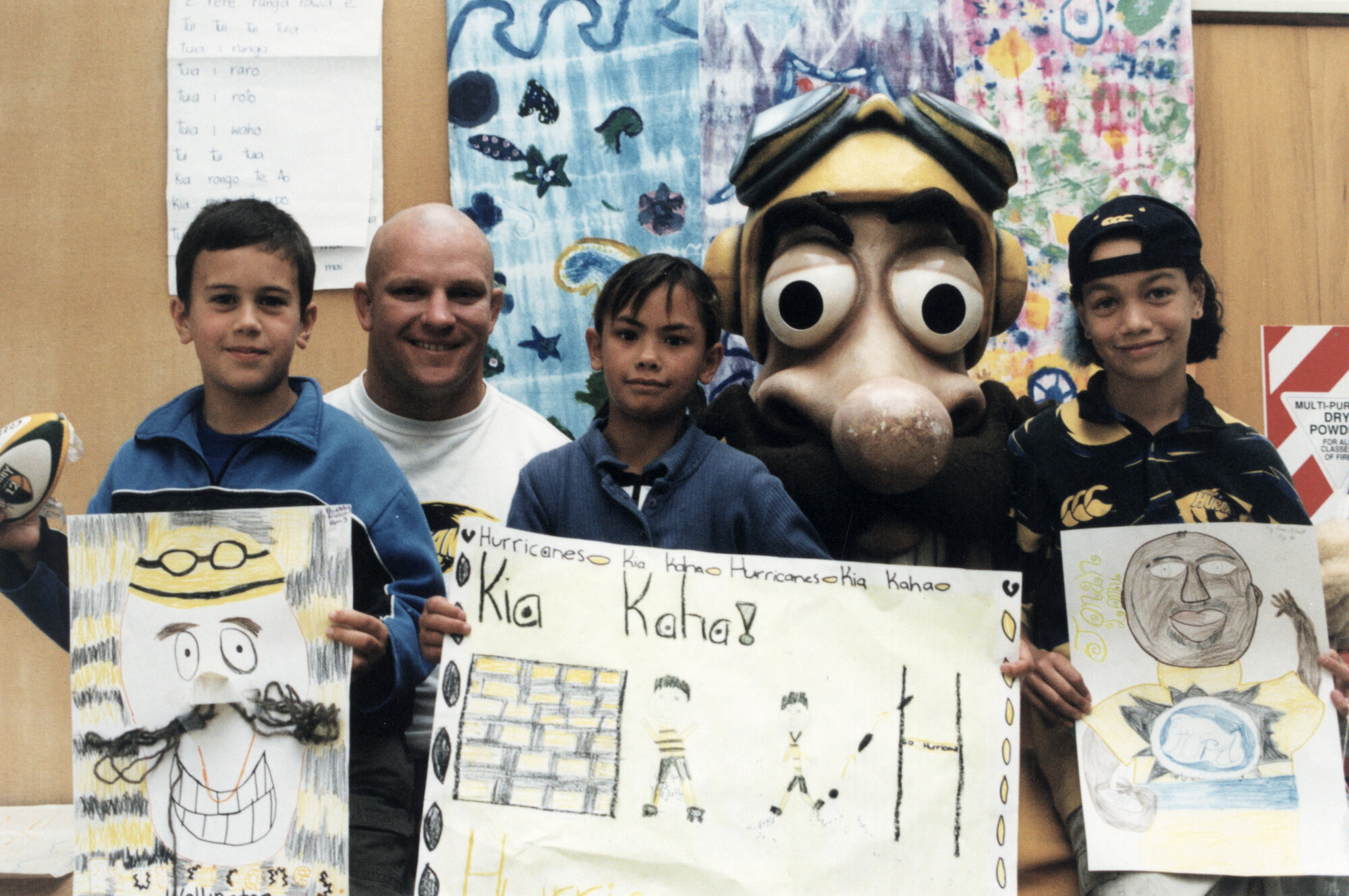 Maoribank School; Captain Hurricane and Bull Allen with Buddy Nuku, 9, Huia Pene, 8, Rema Albrett, 10., 