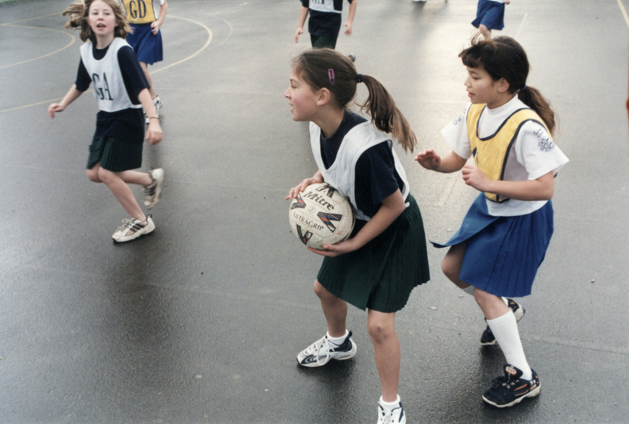 Netball; St Brendan's 'Foxies' in green, 11, Plateau School, gold, 2.