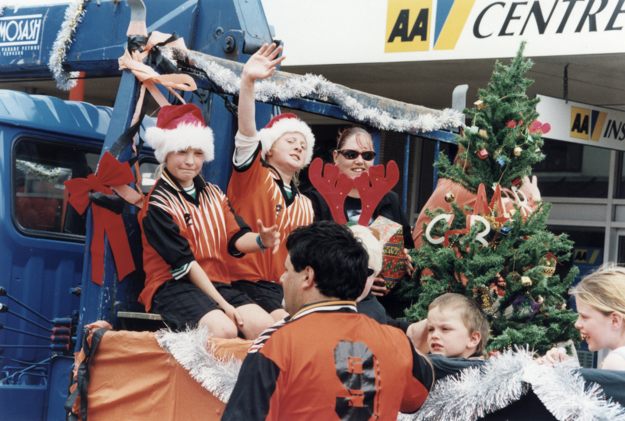 Christmas parade 2003; un-named group; soccer (from the jerseys).