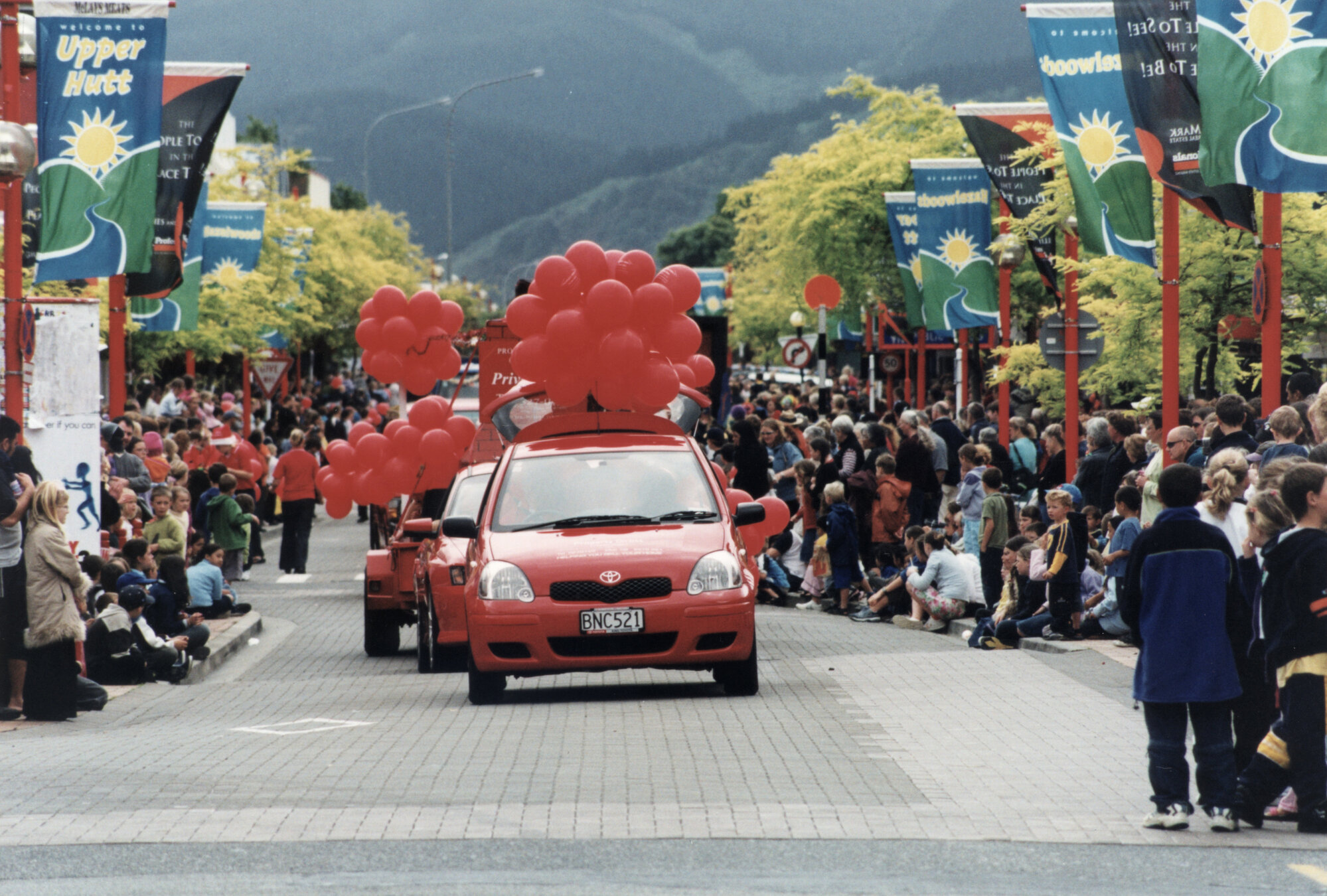 Christmas parade 2003; unidentified balloon carriers.