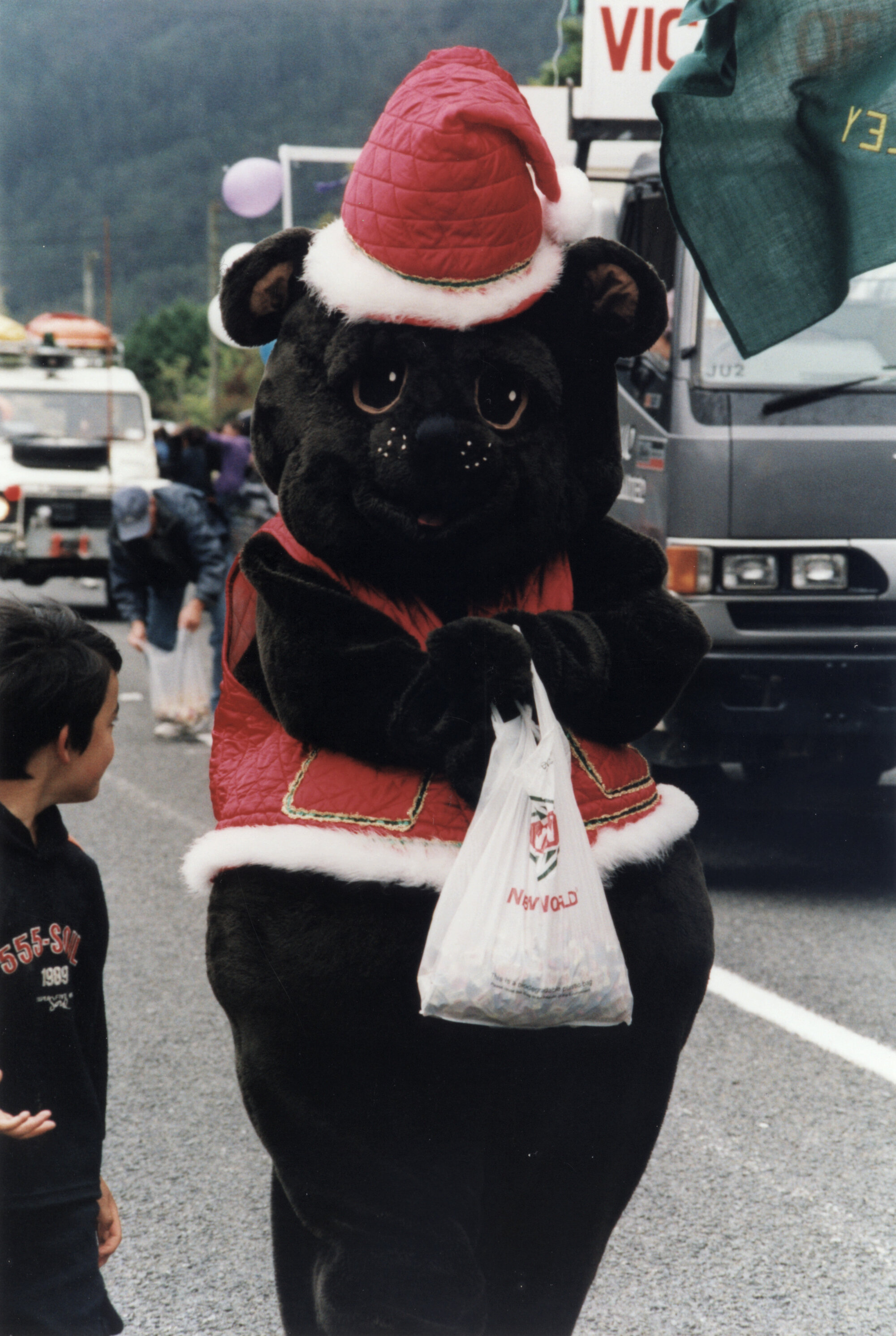 Christmas parade, Stokes Valley, 2003; cuddly toys; black bear.