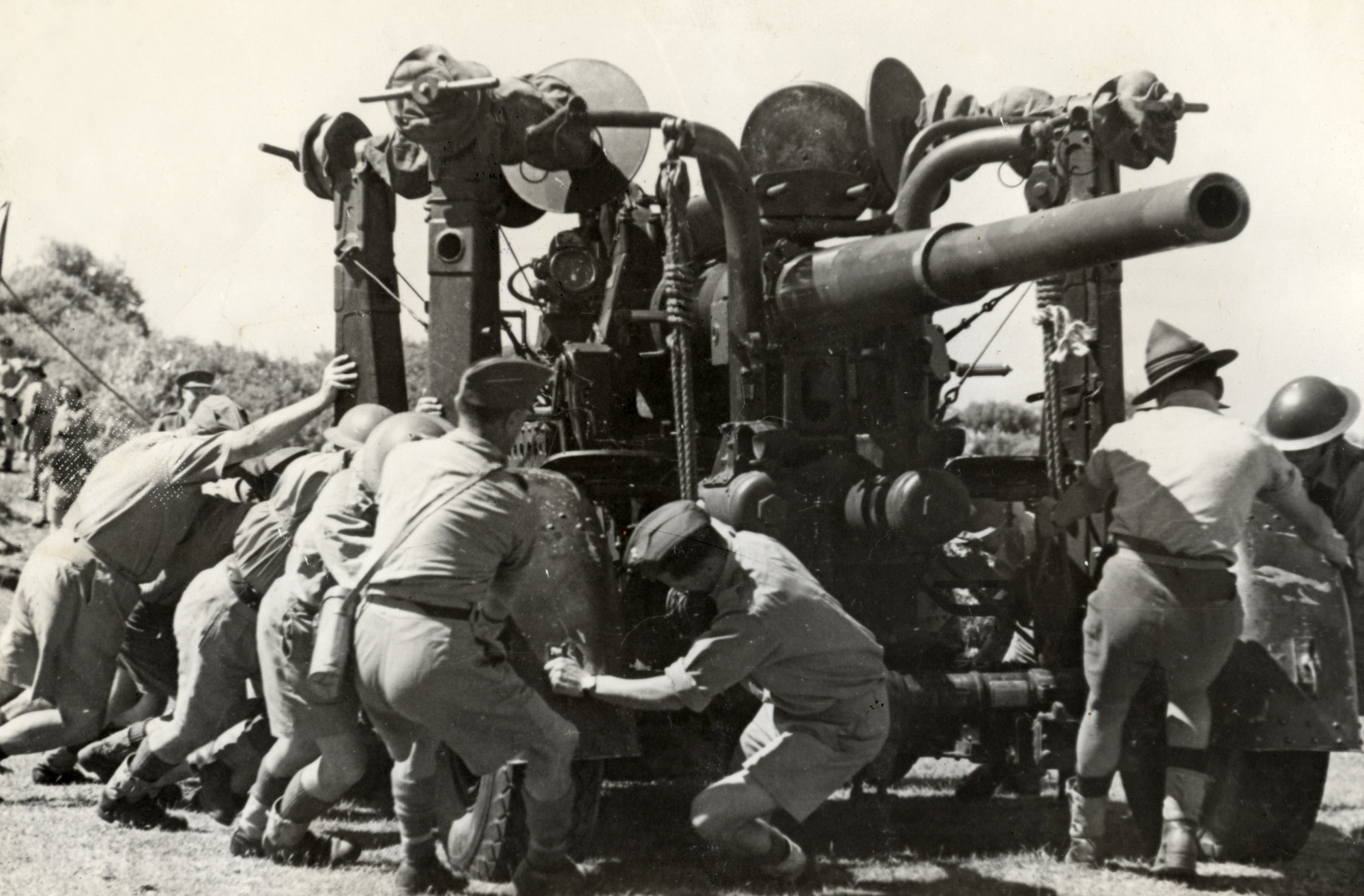 Military Service, World War II; artillery; 3.7-inch anti-aircraft gun.