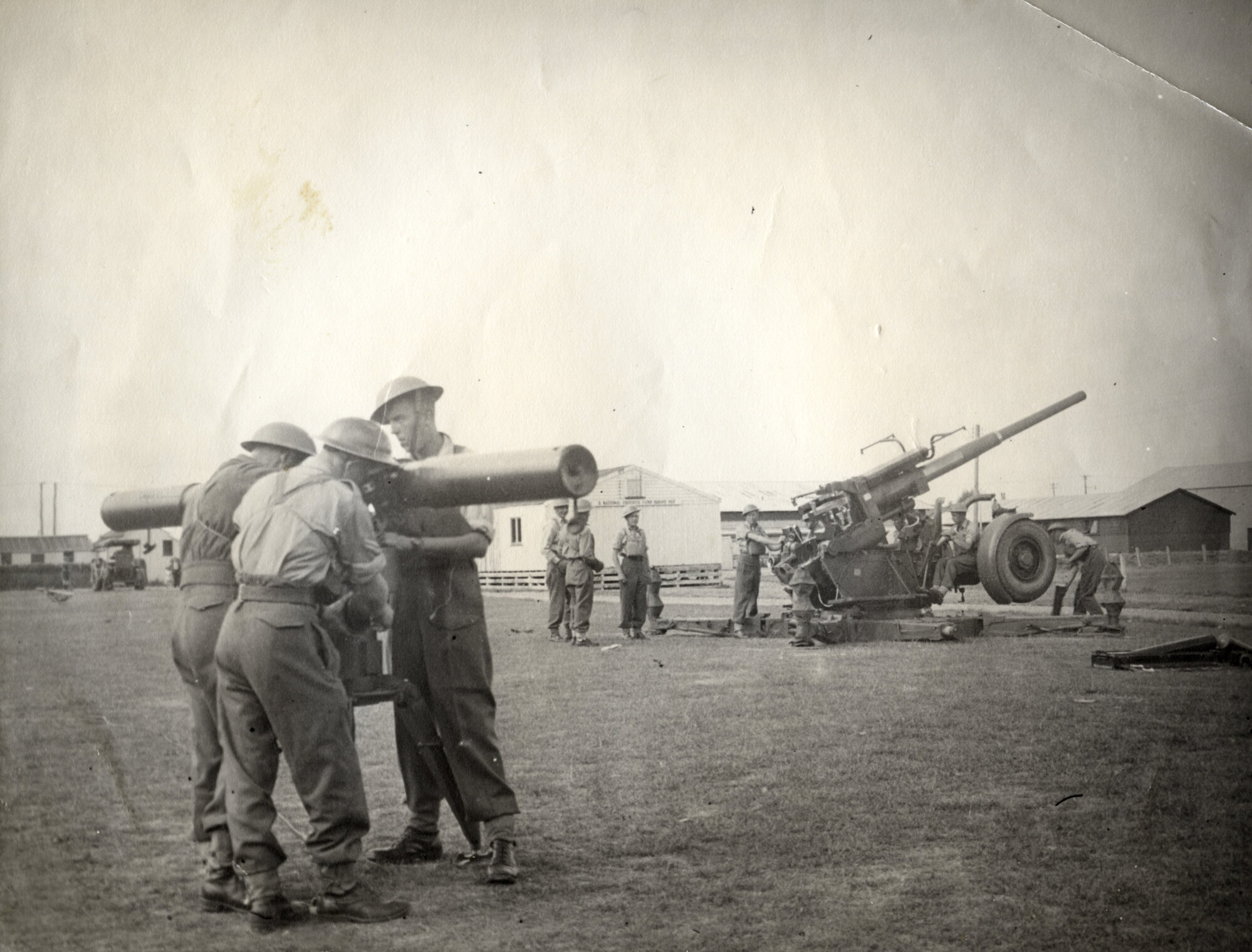 Military Service, World War II; artillery; 3.7-inch anti-aircraft gun and range-finder.