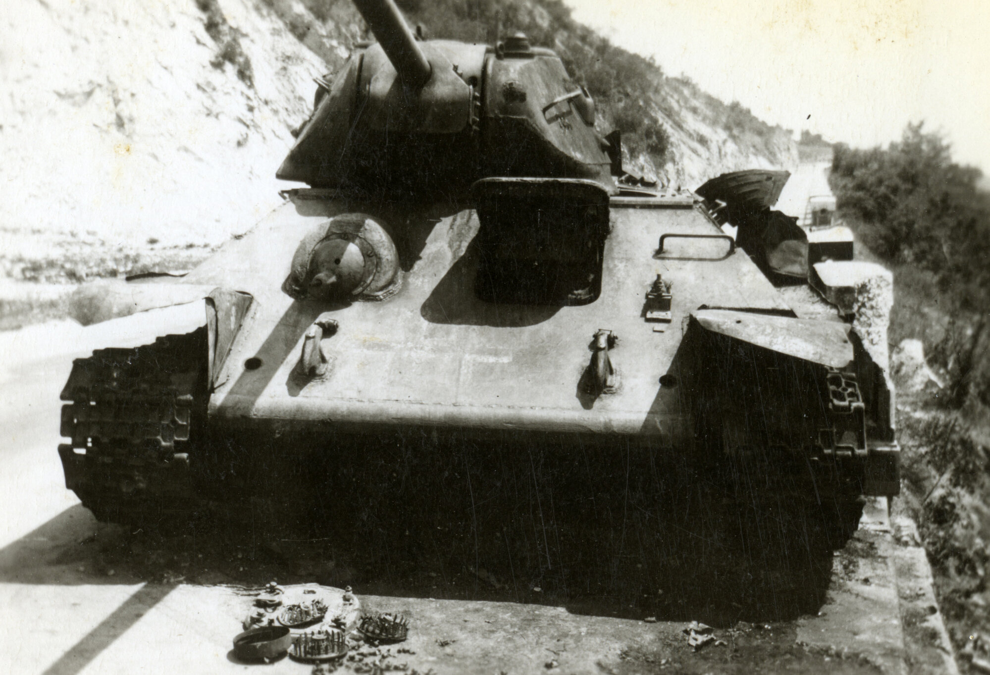 Military Service, World War II; Germany? Russian T34 tank; turret is not seated in its bearing.