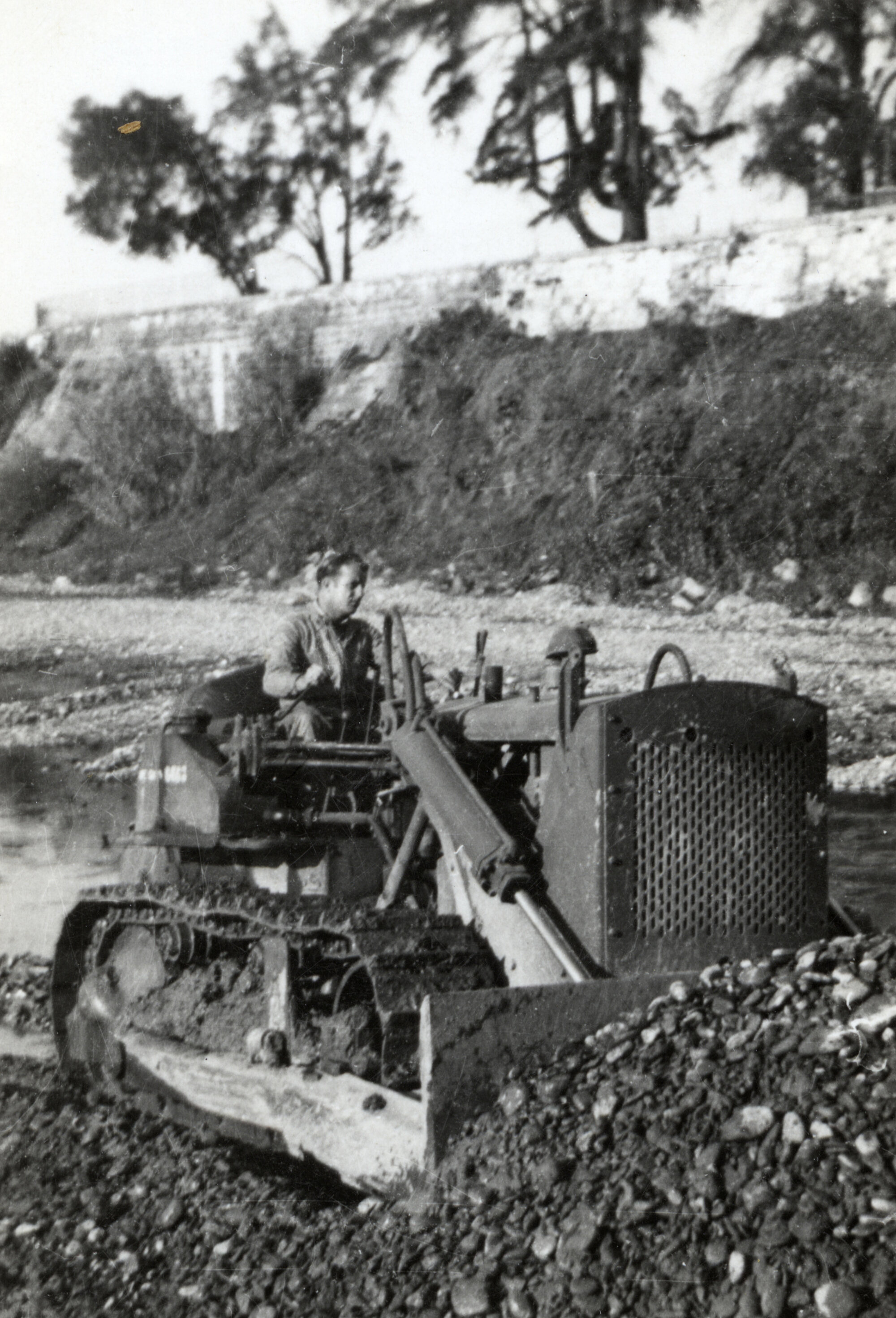 Military Service, World War II; engineers; bulldozer.