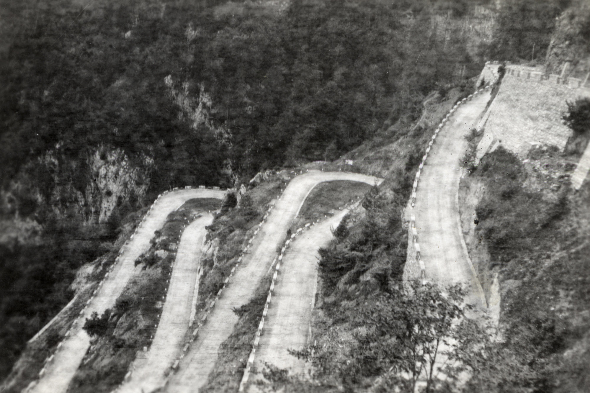 Military Service, World War II; Italy, Dolomites?; switchback road.