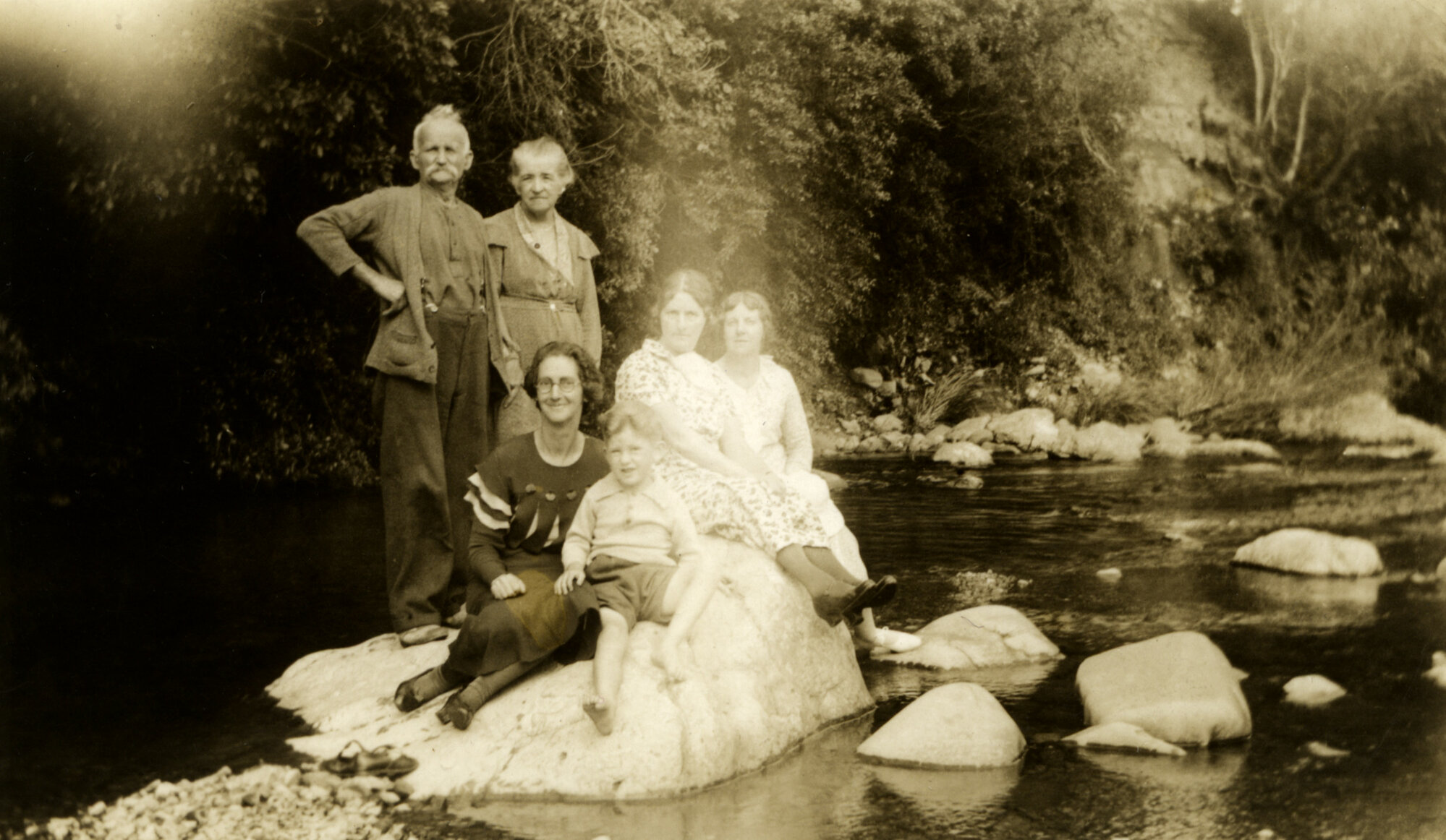 Poulson family; 1937-1938; Carl, Sarah, others, below Akatarawa house.