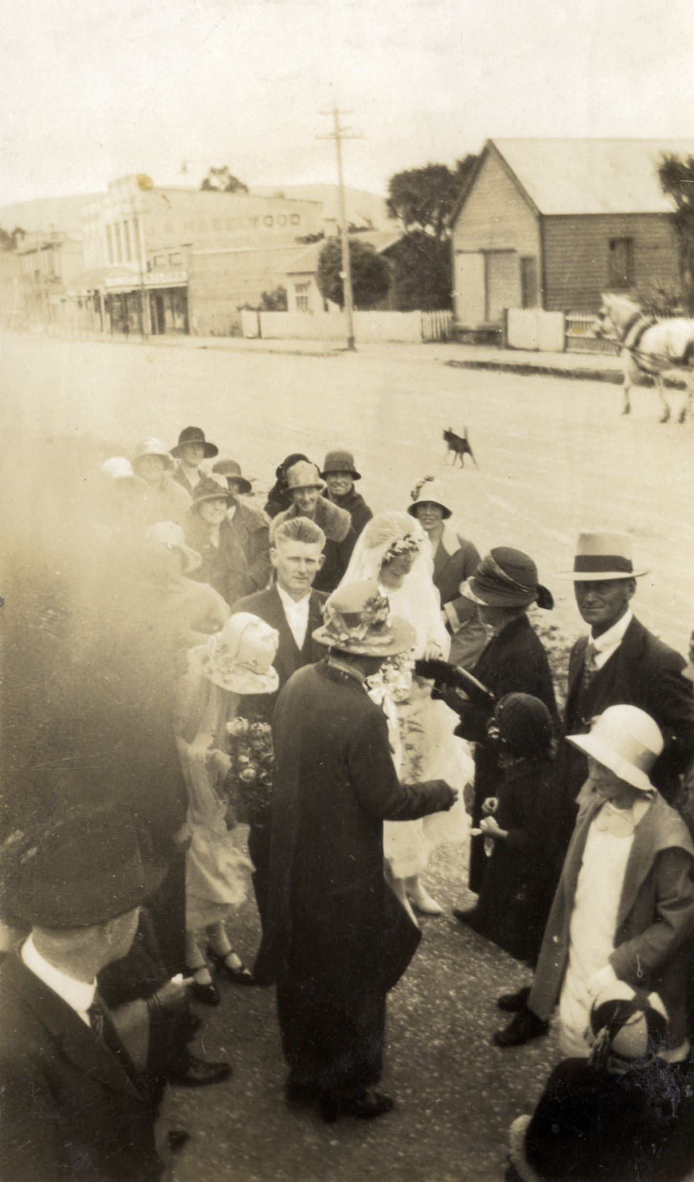 Hazelwood family; wedding 2; unidentified groom and Hazelwood(?) bride, at the Gospel Hall. 