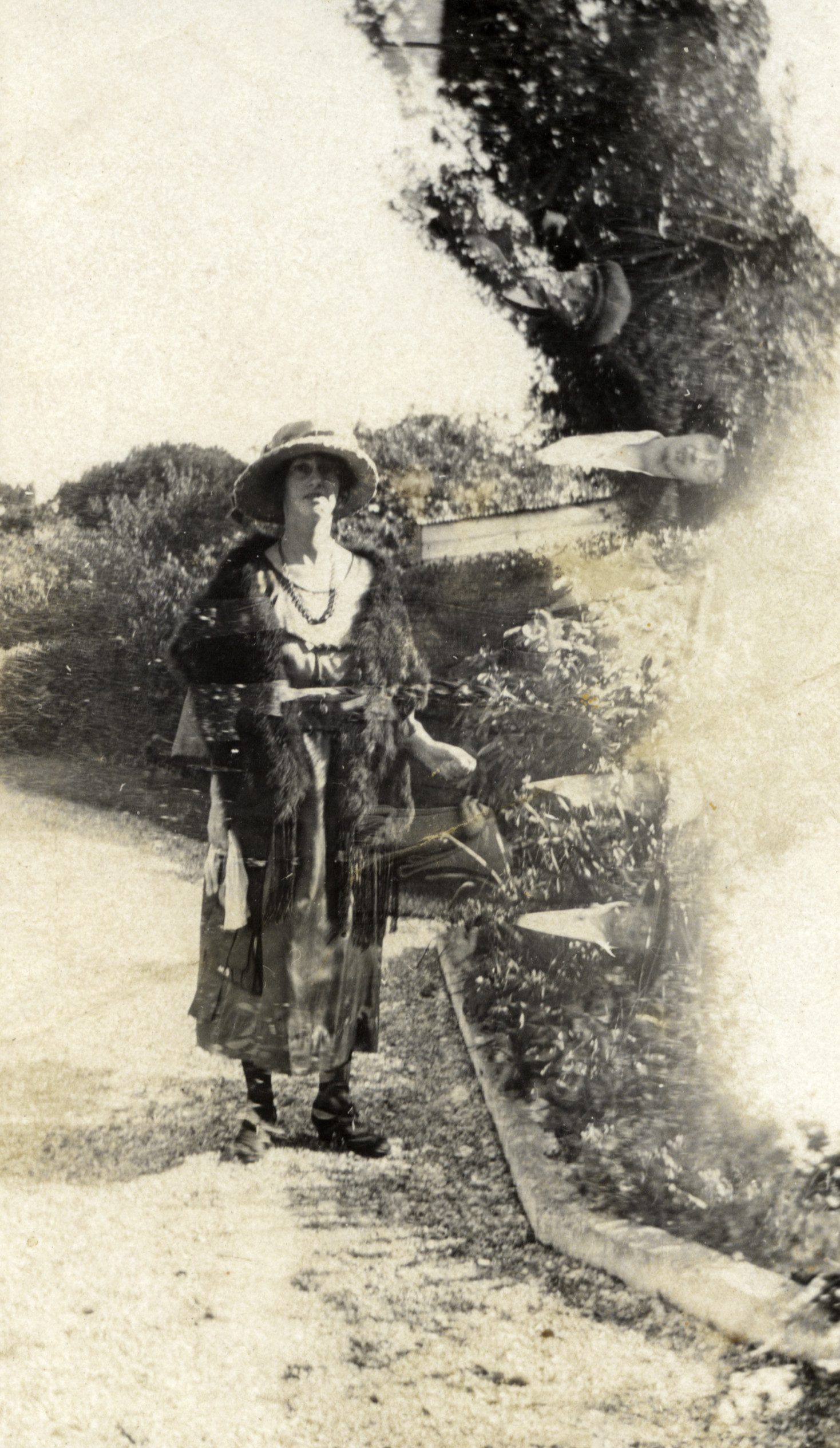 Poulson collection; unidentified woman; May Hazelwood? Double exposure.