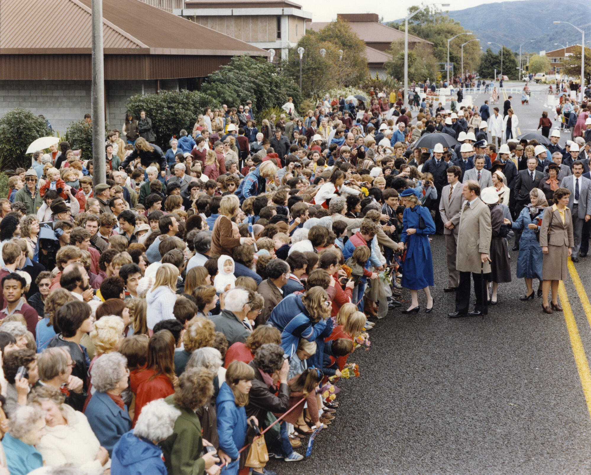 Prince Charles and Princess Diana's visit 7; Diana talking to children.