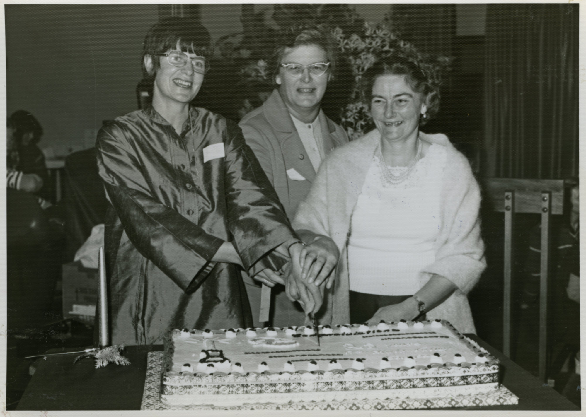 Former Girls Brigade Members Cutting Anniversary Cake