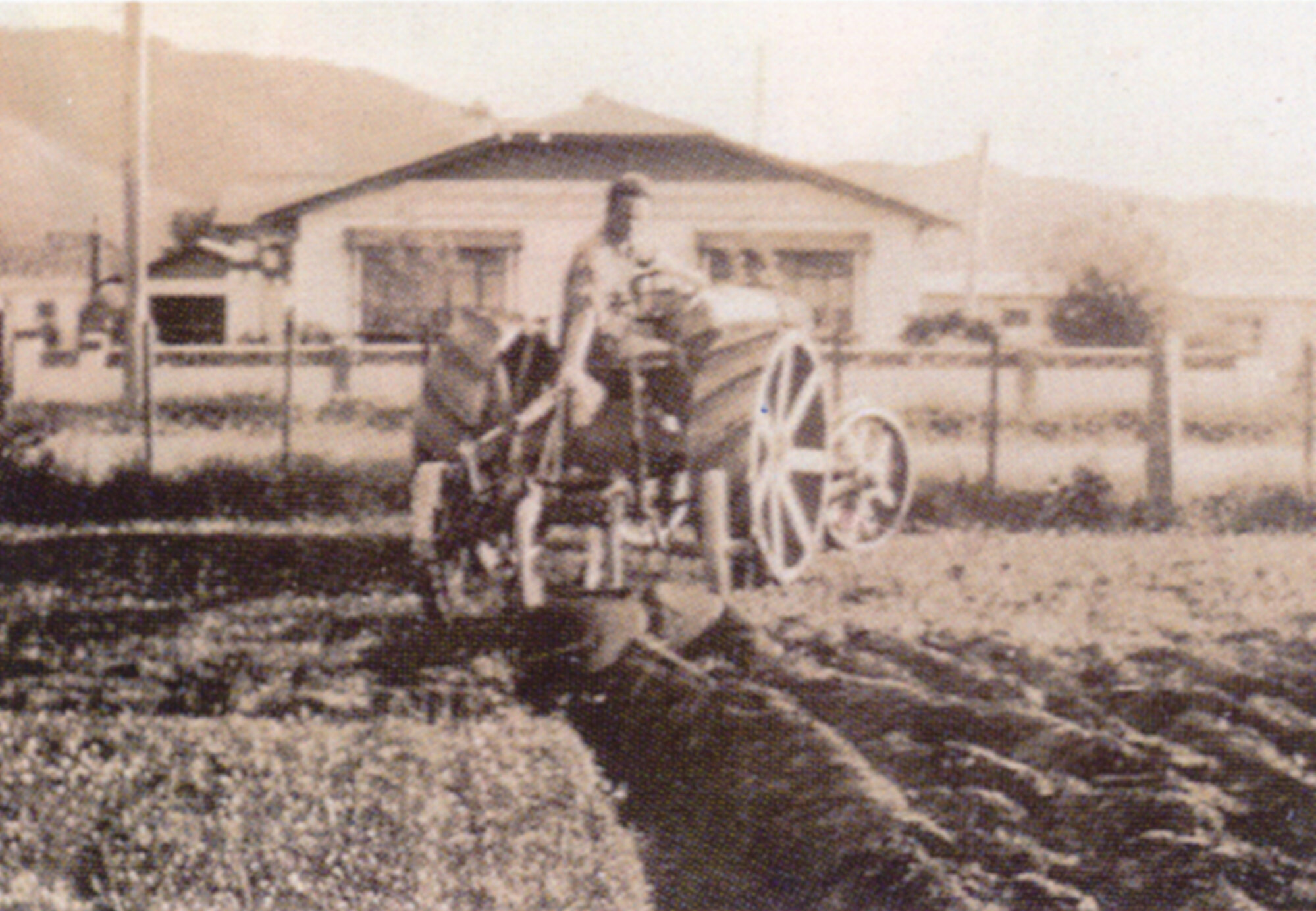 Tractor pulling a plough