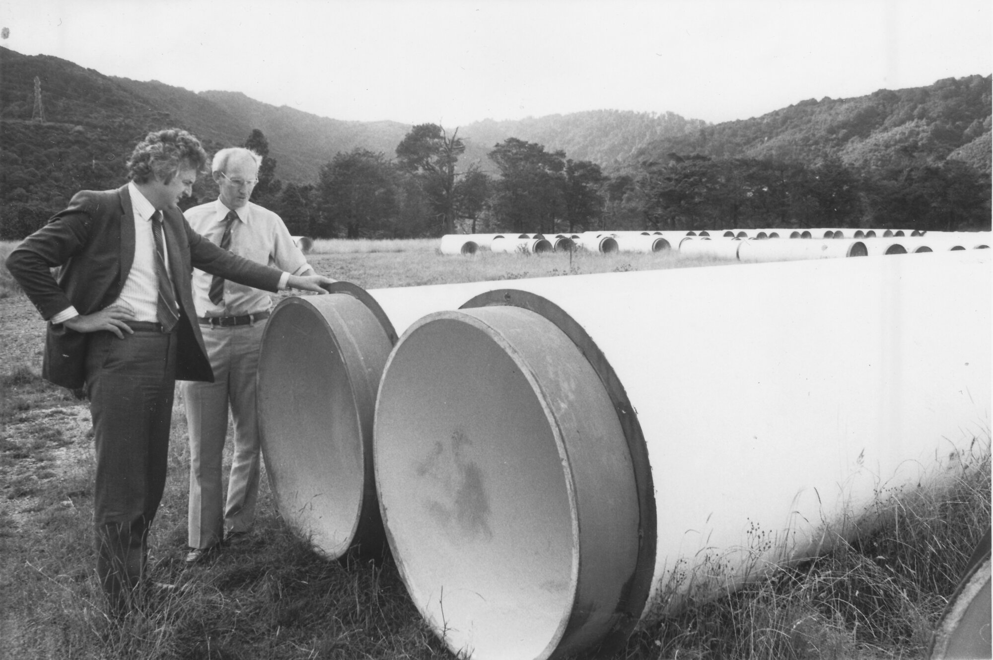 Te Marua; Macaskill water storage lakes;  Bill Jeffries, MP, and Regional Council project engineer Tony Griffiths with pipes for internal connections.
