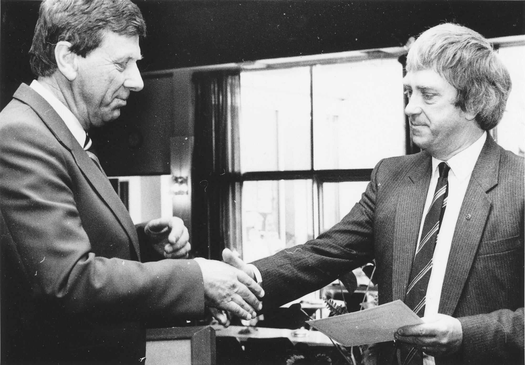 Rotary president Brian Kerr and Golder Homestead Museum Society fundraising manager Gary Cooper.