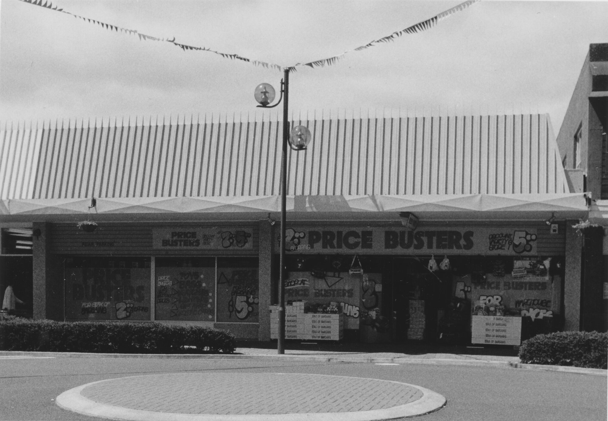 Main Street, 1997, south side; No. 156-158; Price Busters (cheap goods).