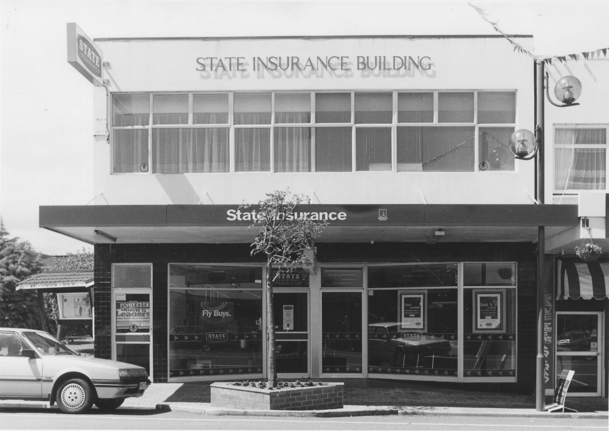 Main Street, 1997, south side; No. 16; State Insurance.
