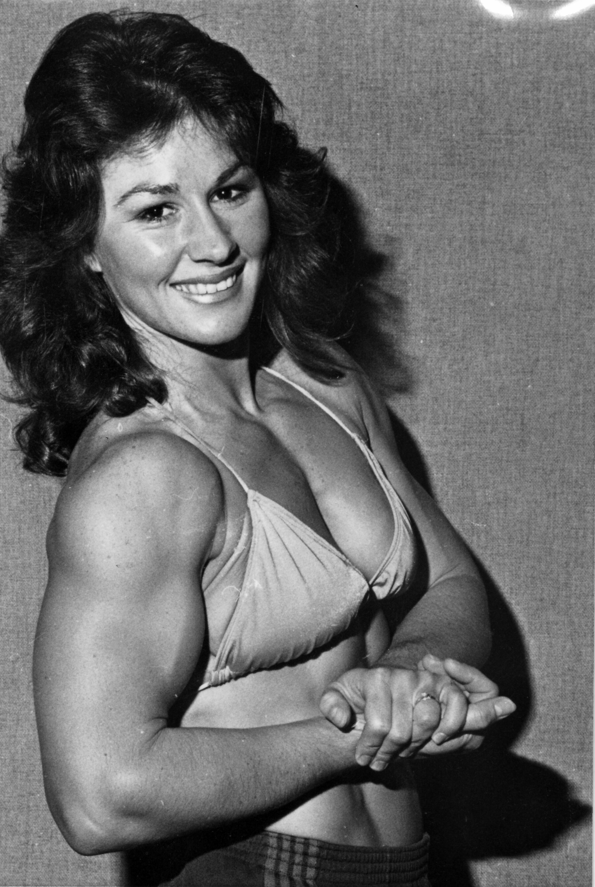 Body-building; Wellington championships; Gina Tomillo; winner of novice over-52-kg title.