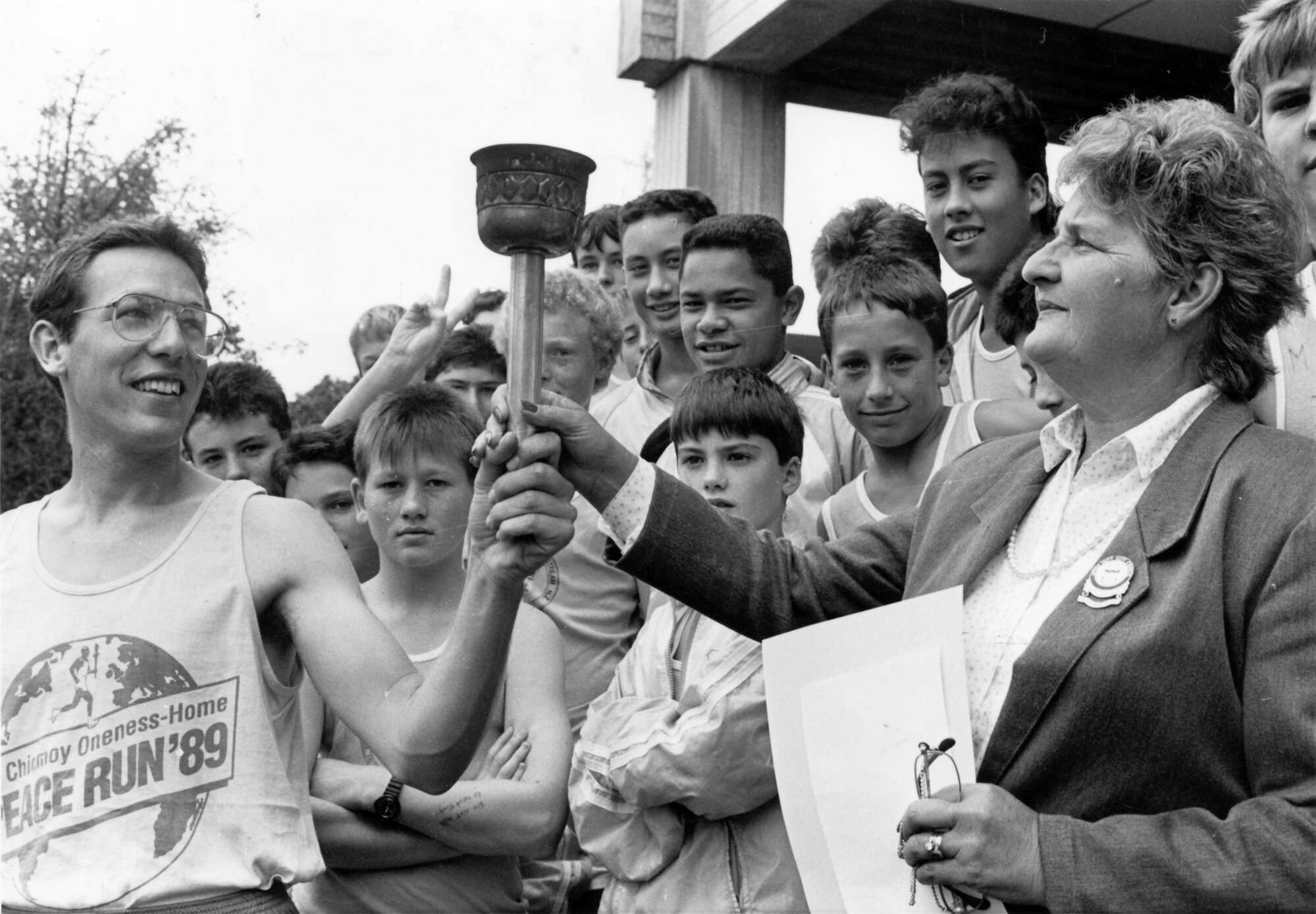 Peace run, Auckland-Wellington; Salil Williamson presents Councillor Shirley Russell with a torch.