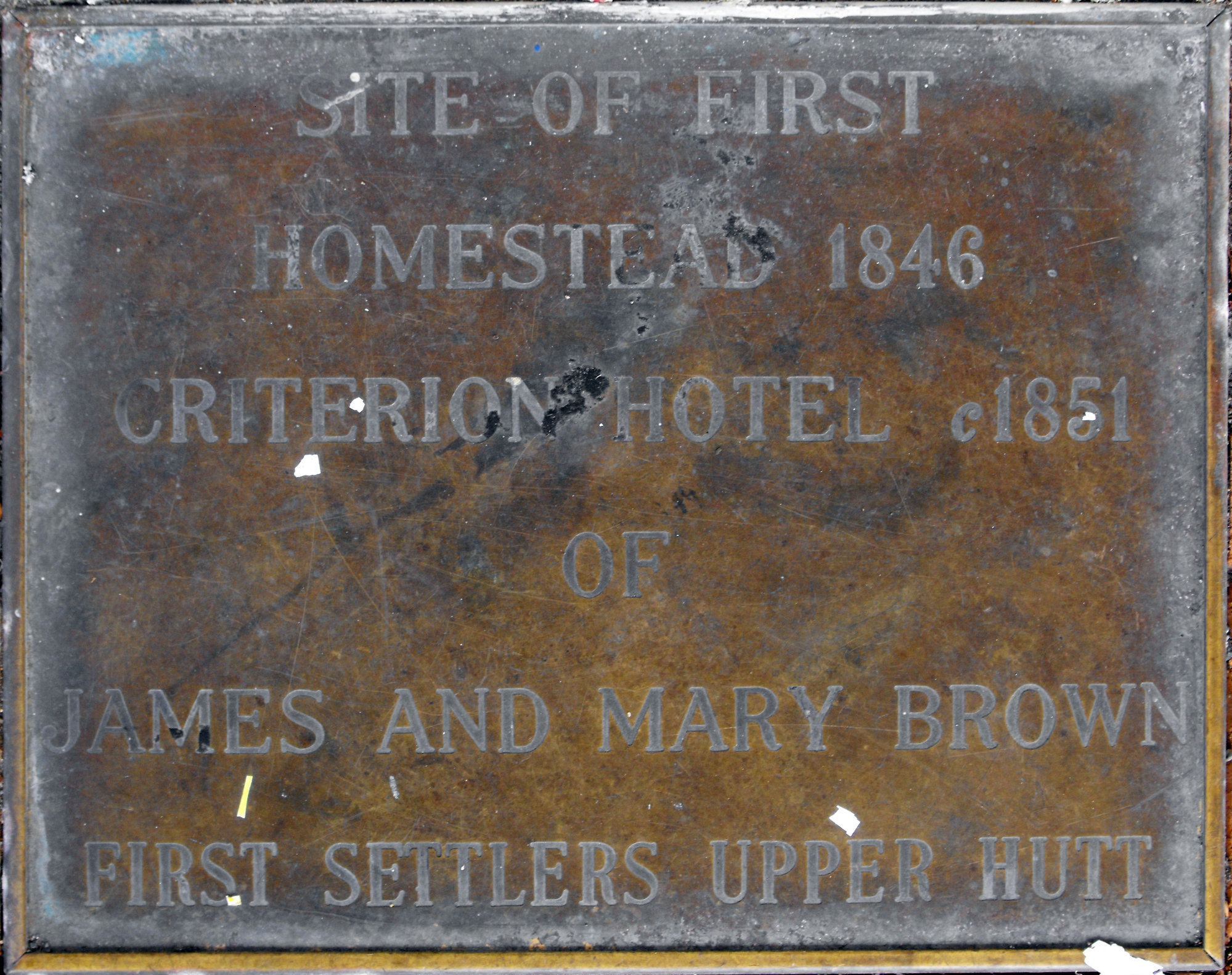 Historic site plaque, Main Street; Brown family and the Criterion Hotel.