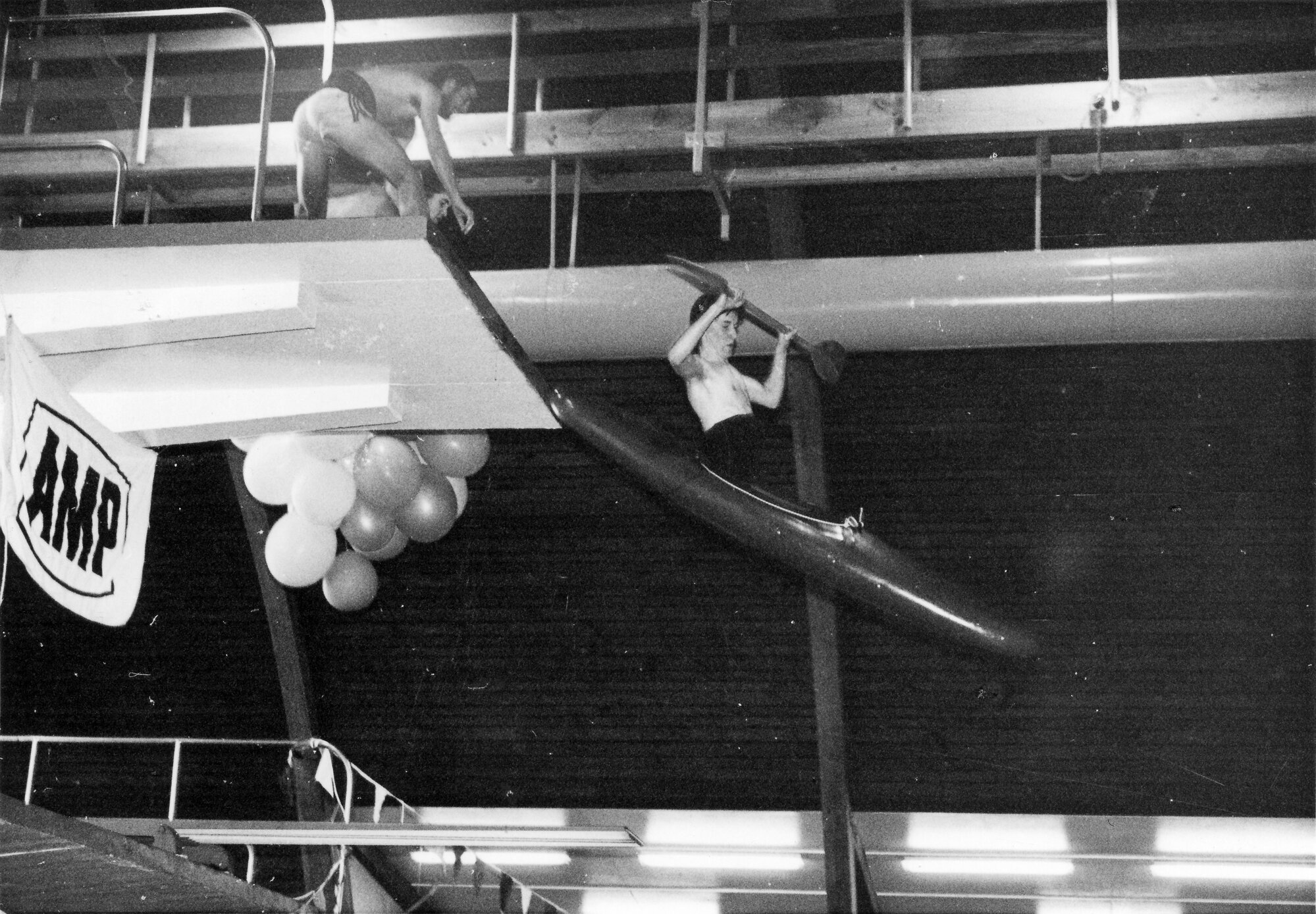 Canoeist Jeff Sutherland dives from Naenae Olympic Pool's 5-metre board.