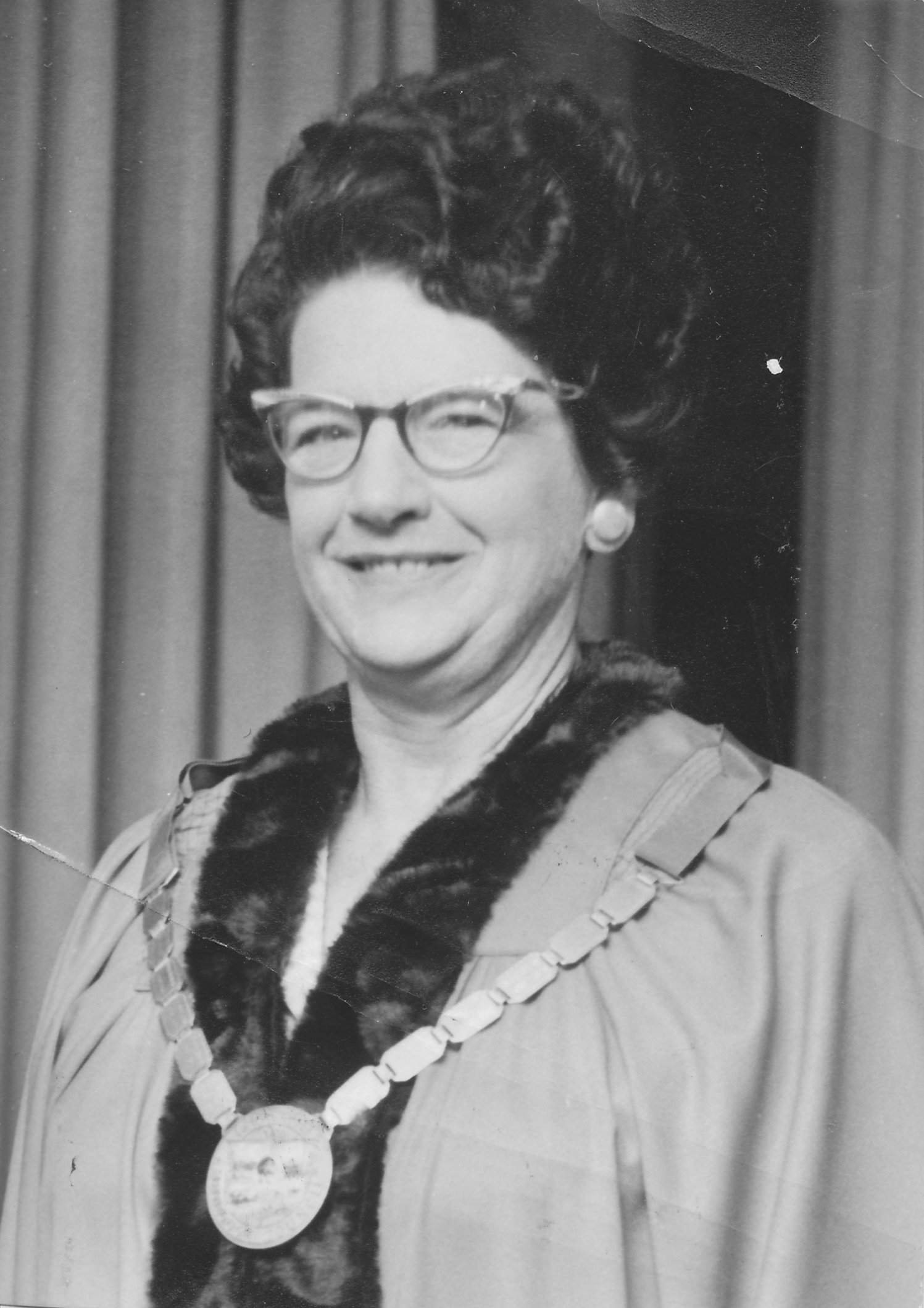 Doris Nicholson, mayor; printed as  part of an array of the 1974-1977 City Council.