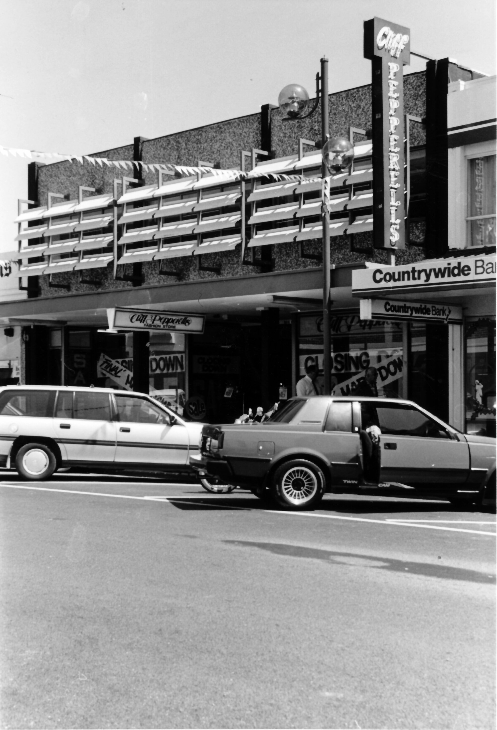 Main Street, north side; No. 119-121 , Cliff Pepperell's Fashion Store closes after 44 years.