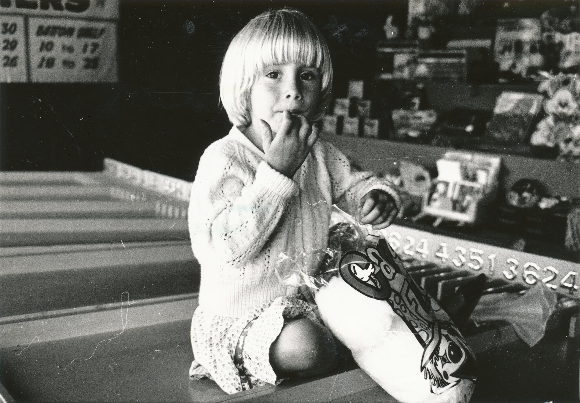 Summer Carnival 1988; Alanagh Cuncannon, with candyfloss, keeping an eye on the stall next to her uncle's.