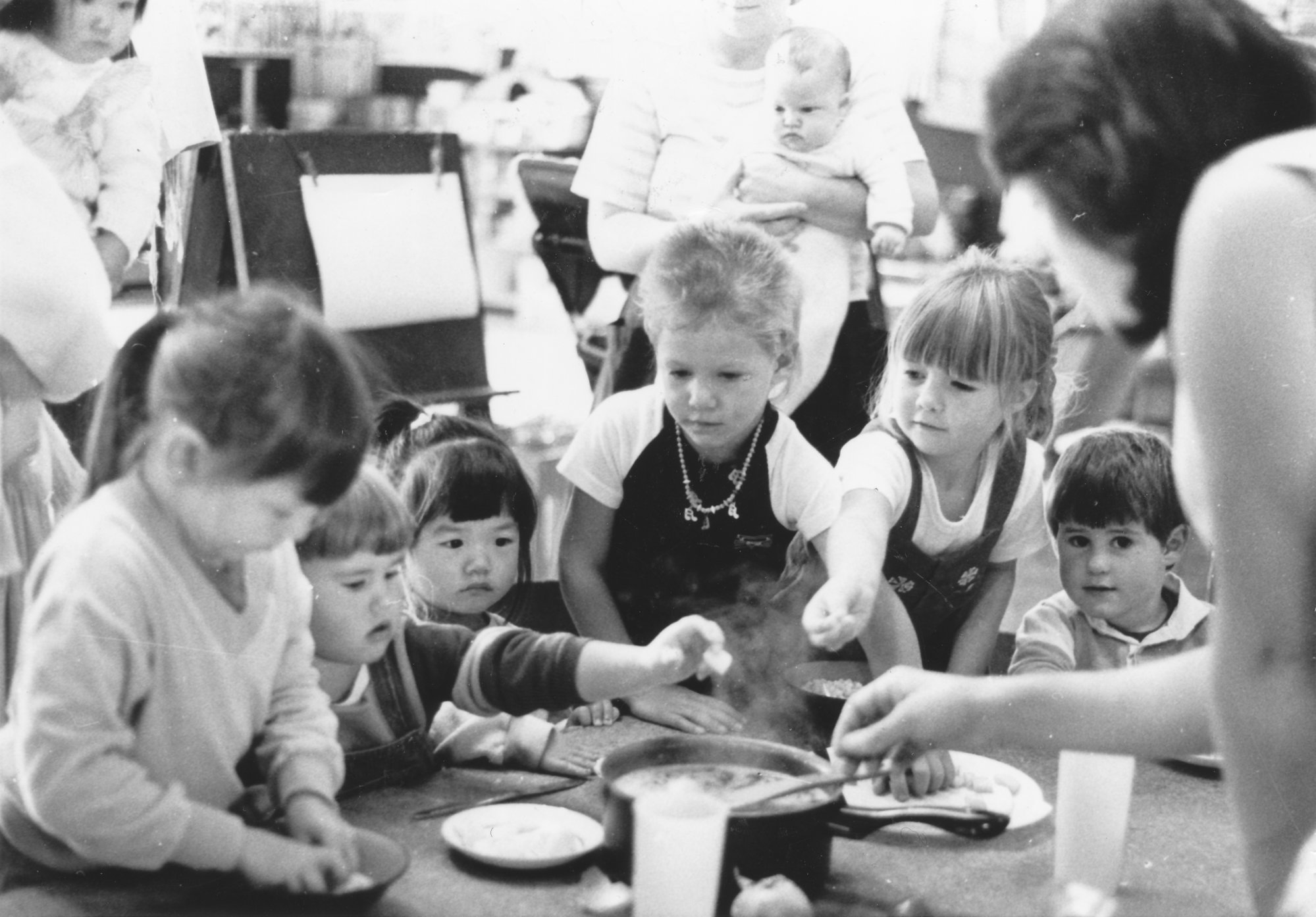 Totara Park Playcentre; Alice, Terryne, Rachel, Ricky, Carolyn and Joshua, with Jenni Mason, making 'stone soup'.