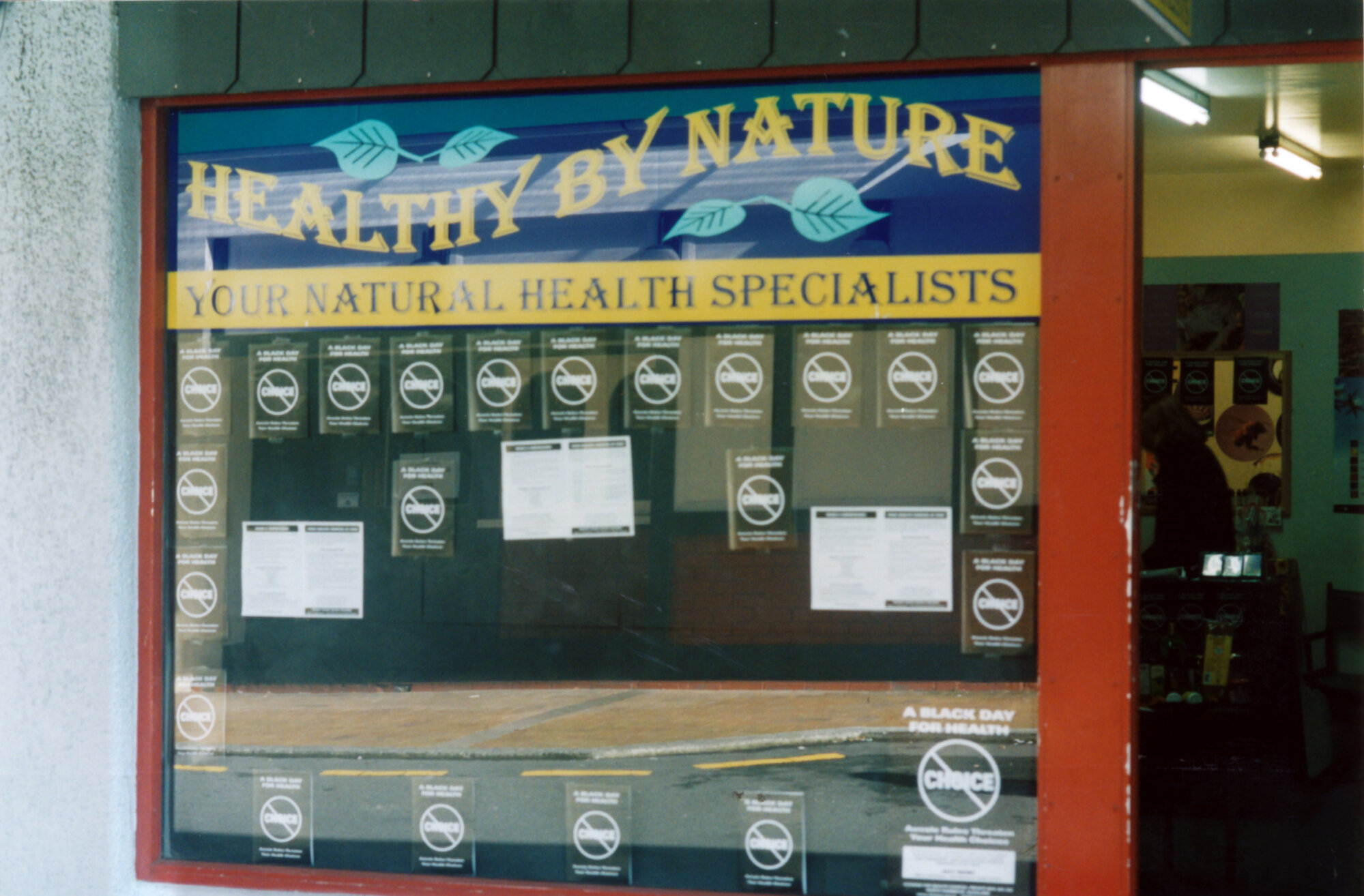 Health food store protests against proposed trans-Tasman agreeement on controls.