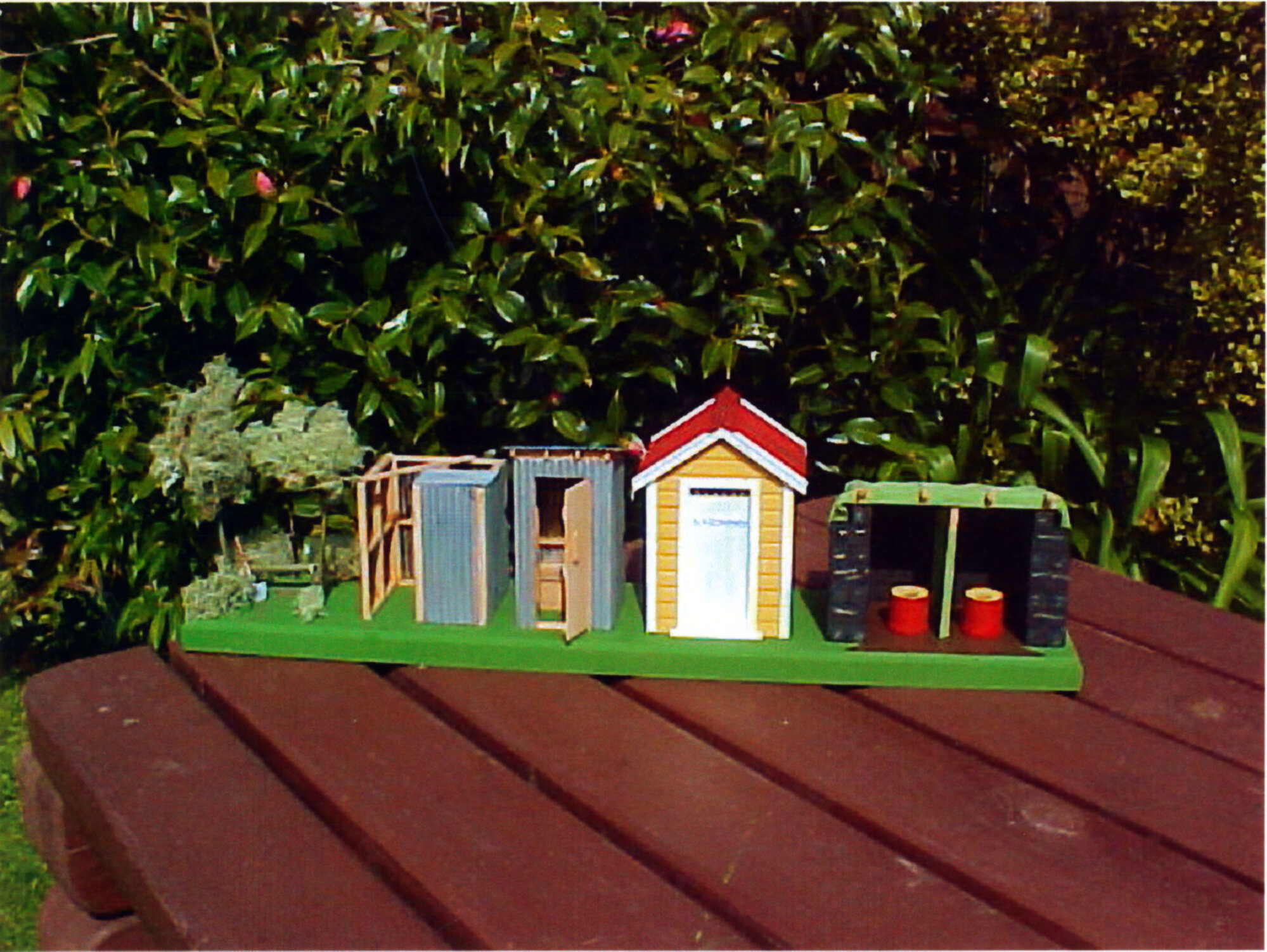 Scale model buildings; 'memorable longdrops'.
