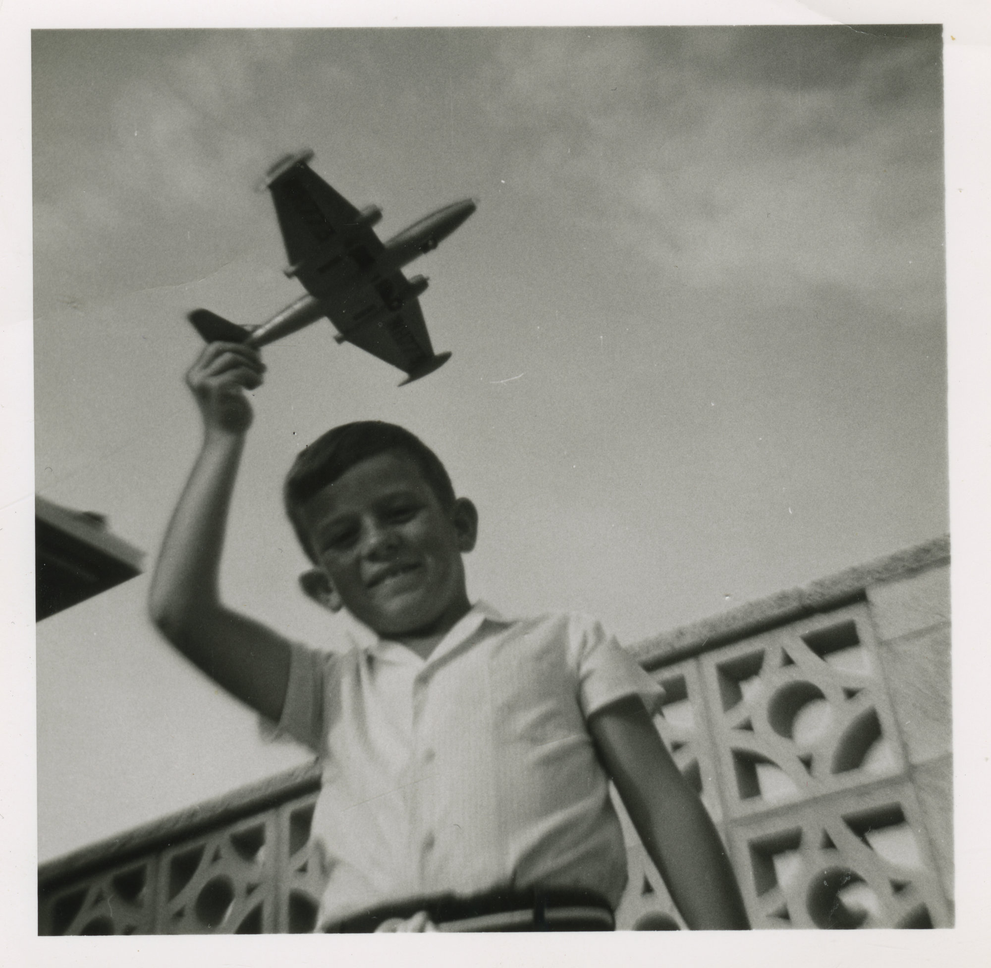 Harris family; John Harris with toy plane, Sandford St, Upper Hutt, c. 1968